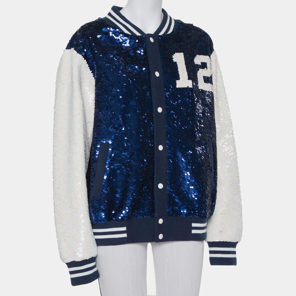 This amazing jacket from Ashish is incredibly chic and effortlessly stylish. The navy blue and white creation is designed in a relaxed silhouette with striped ribbed collars and bottom hems. Embellished with dazzling sequins all over, it flaunts the