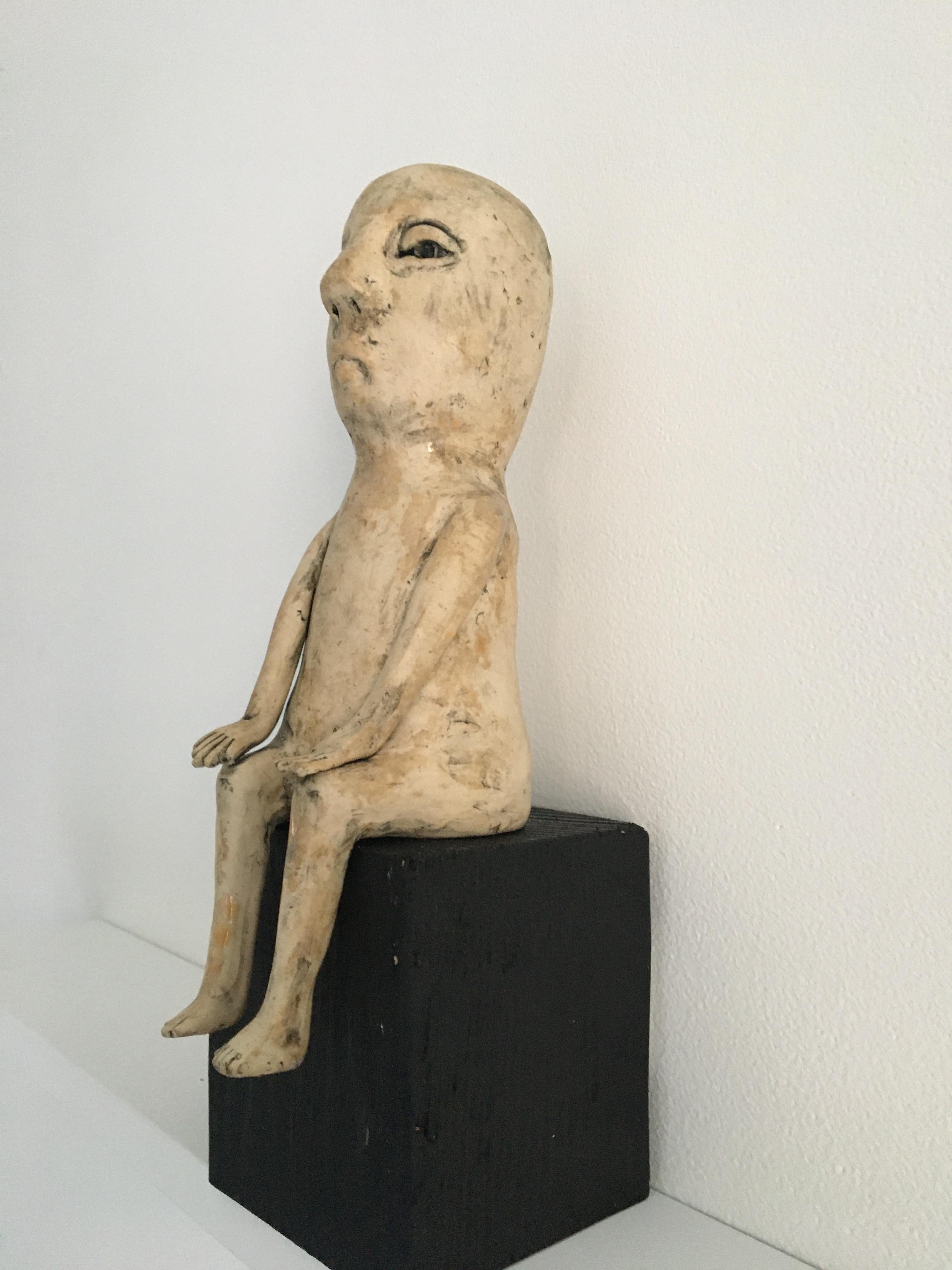 Ceramic figure on wood block: 'Enough of this' - Sculpture by Ashley Benton