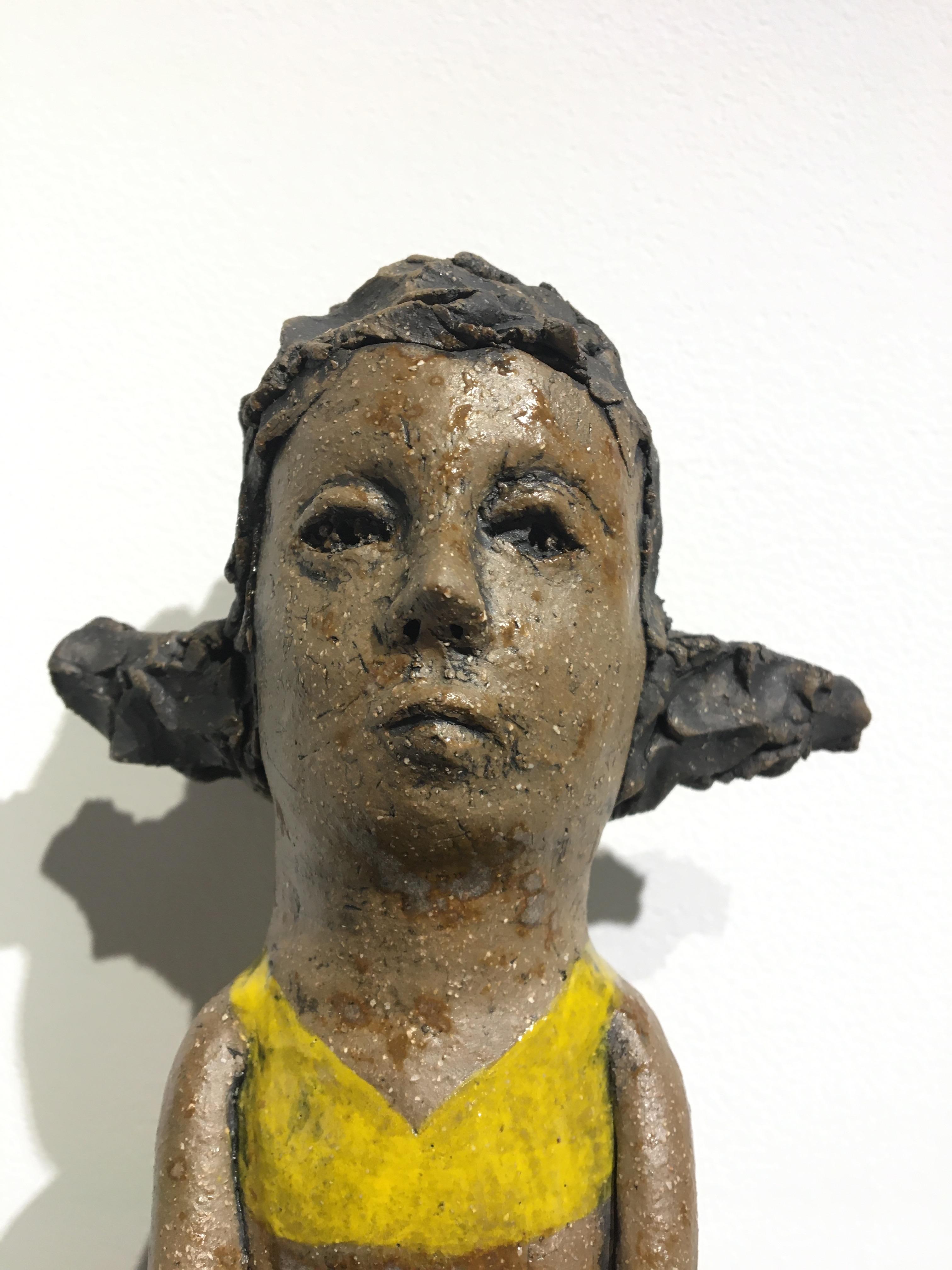 Ceramic figure on wood block: 'Hush up and hold me tight' 1