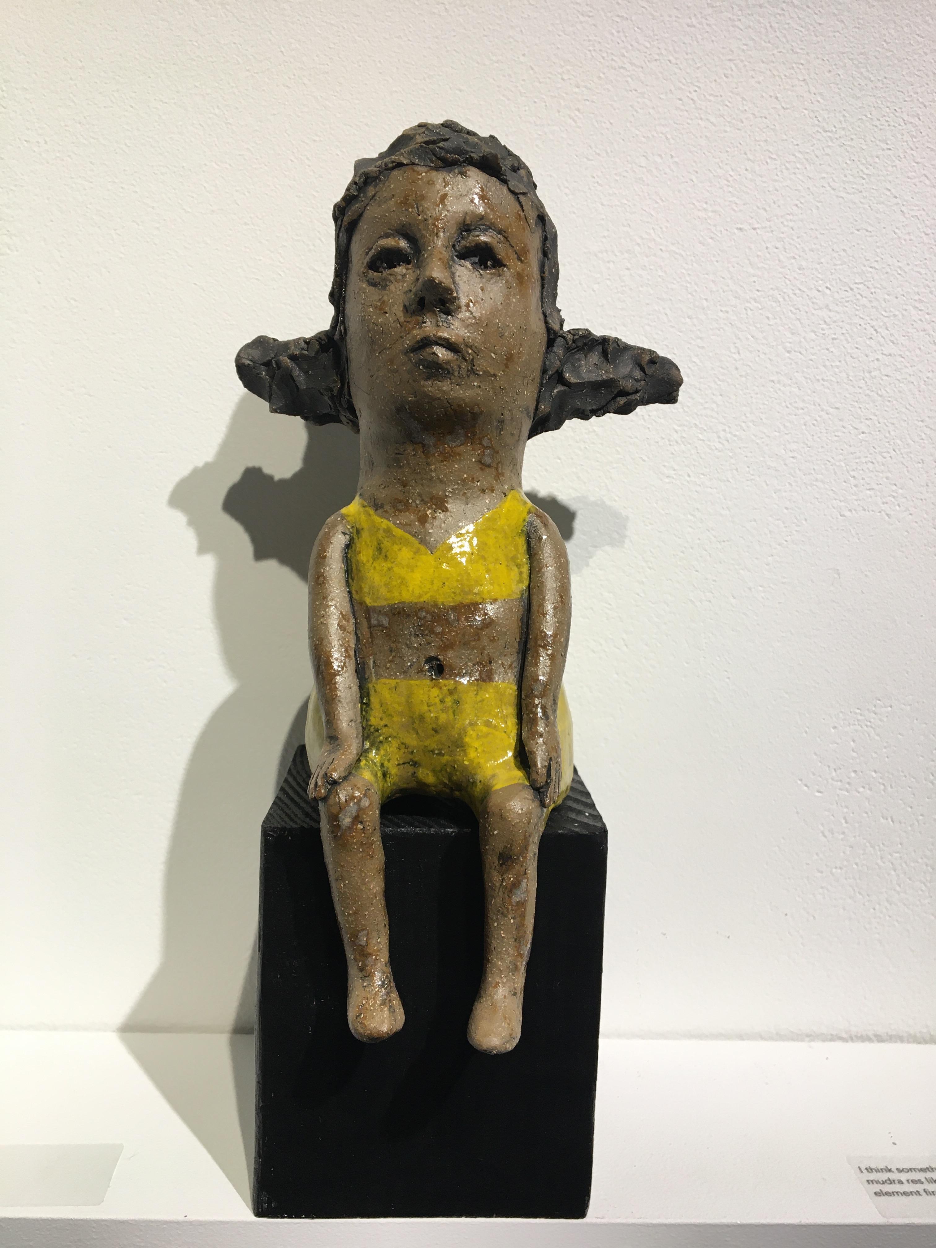 Ashley Benton Figurative Sculpture - Ceramic figure on wood block: 'Hush up and hold me tight'