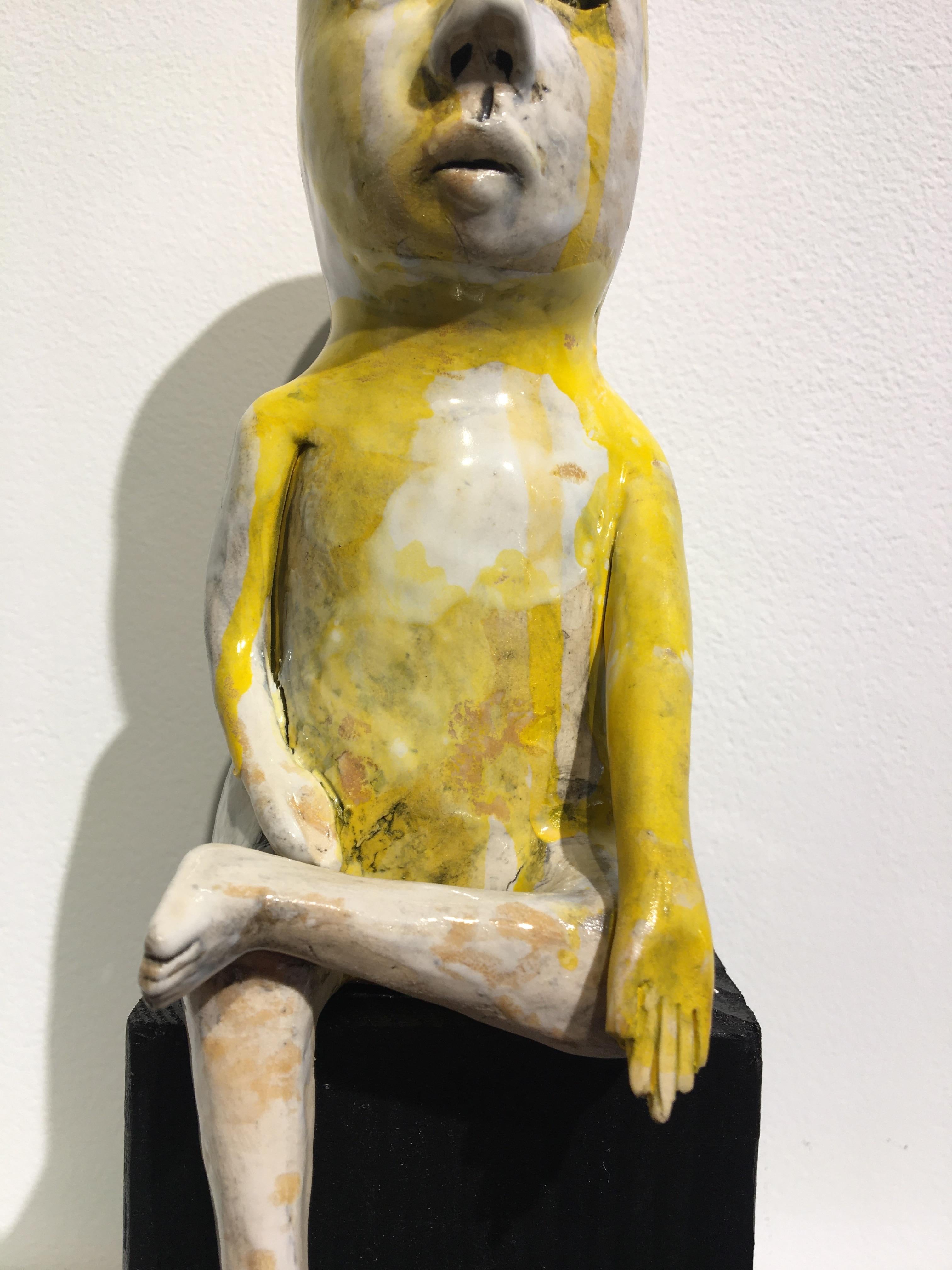 Ceramic figure on wood block: 'Varada mudra boy' - Beige Figurative Sculpture by Ashley Benton