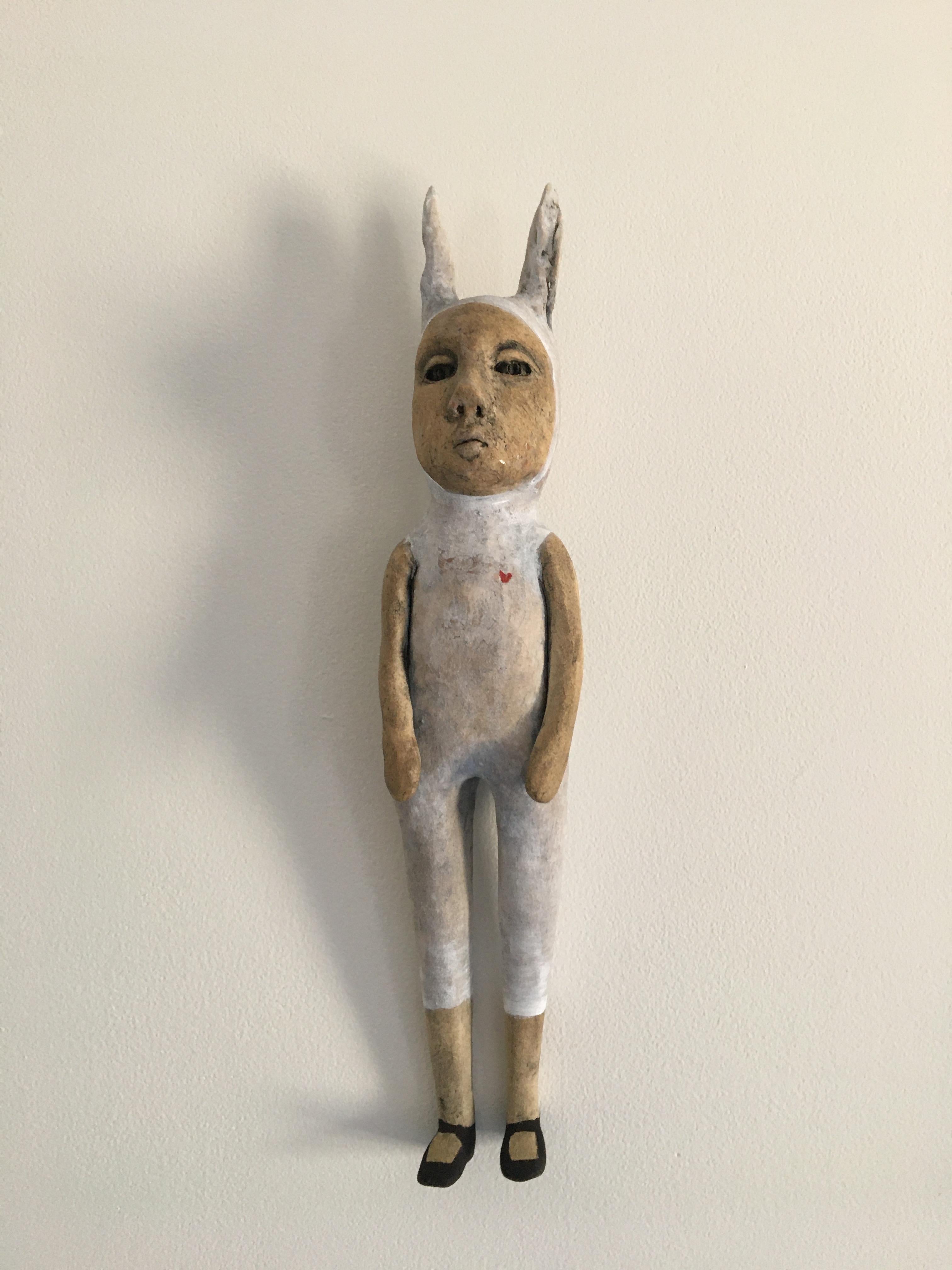 Ashley Benton Figurative Sculpture - Ceramic hanging wall sculpture: 'All we need is love'