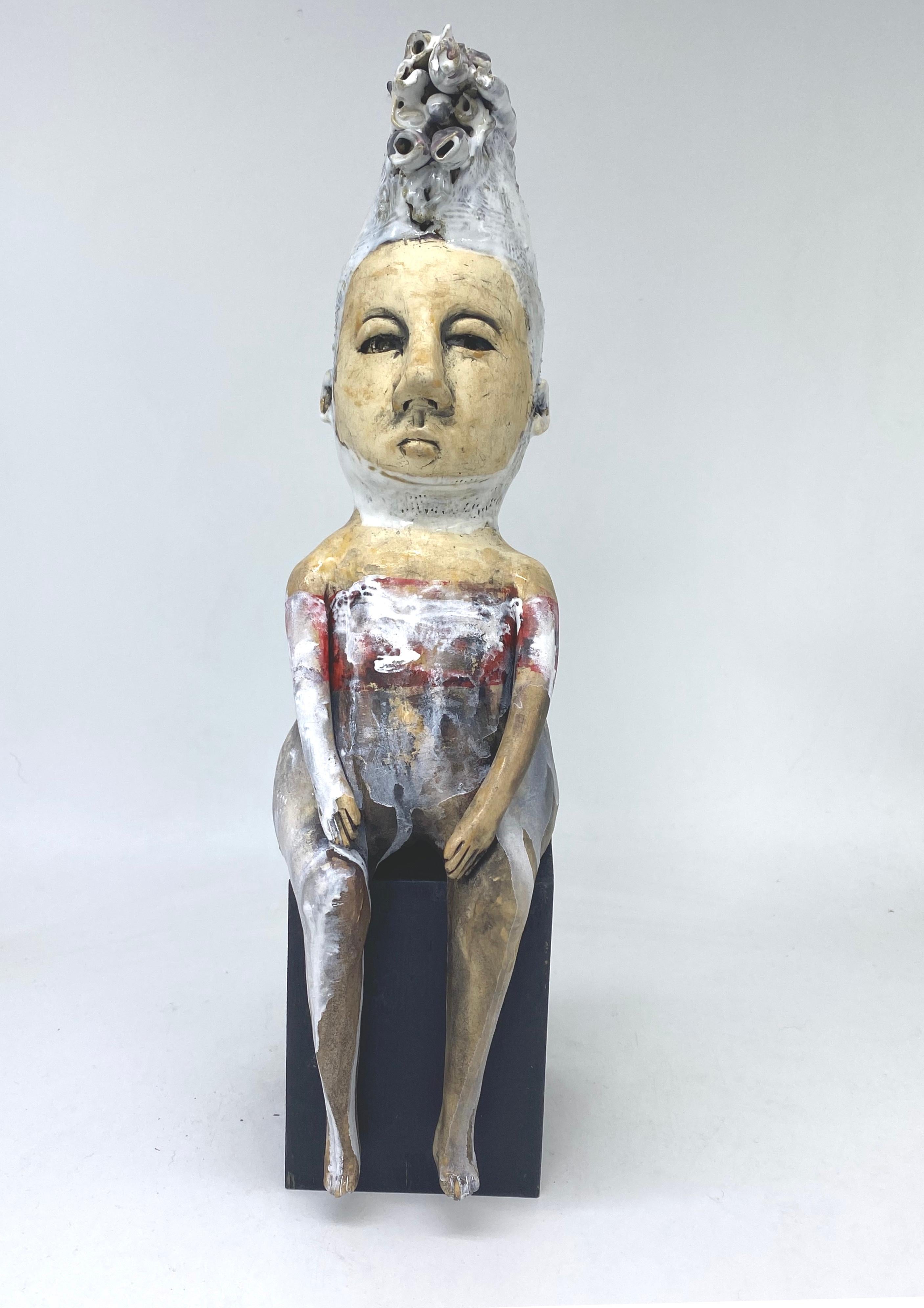 Ashley Benton Figurative Sculpture - Ceramic seated figure: 'Sitting with the fire' 