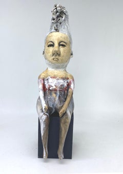 Ceramic seated figure: 'Sitting with the fire'