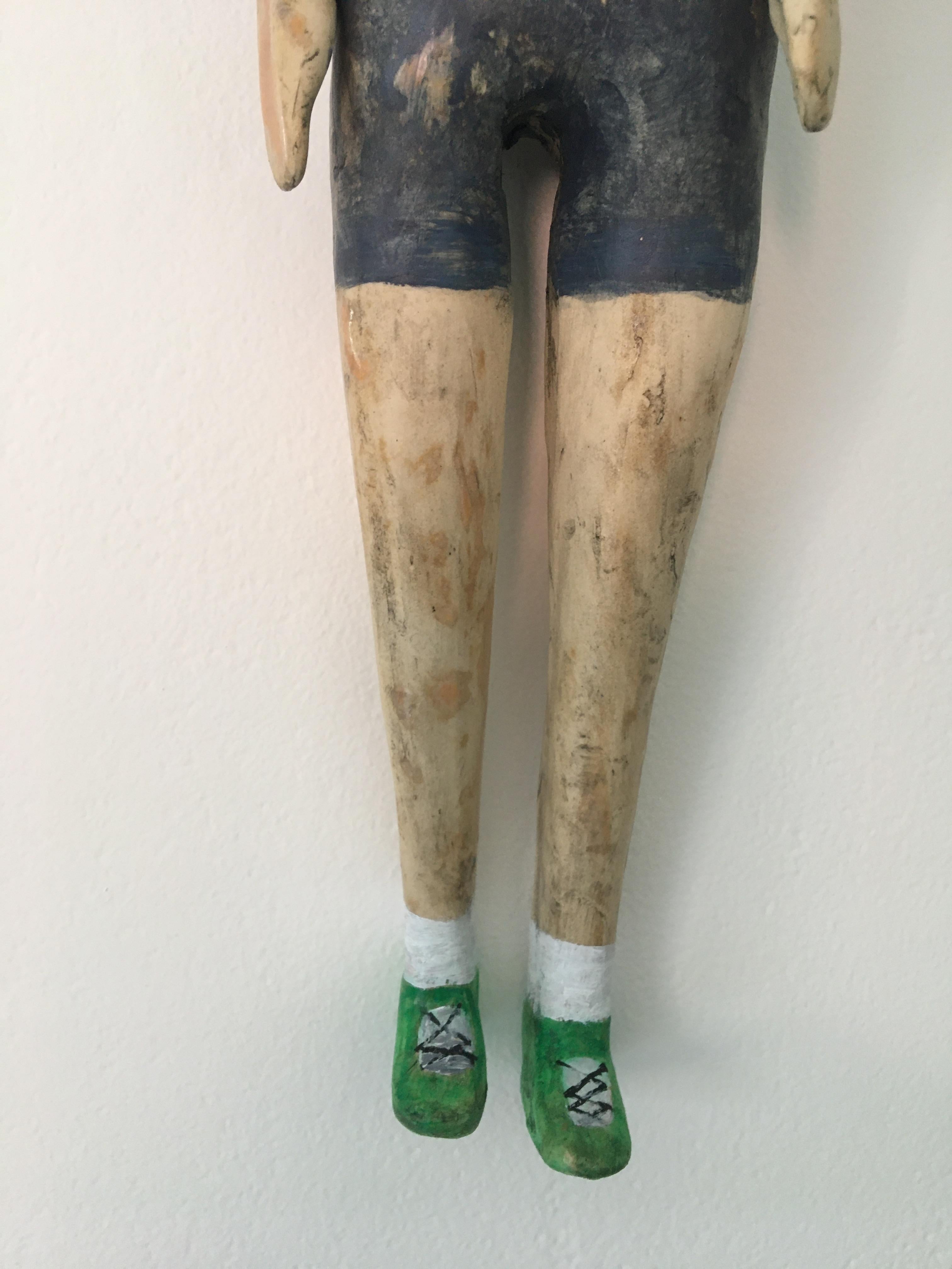Ceramic wall hanging: 'In 6th grade I got a pair of Nikes that were fast' - Beige Figurative Sculpture by Ashley Benton
