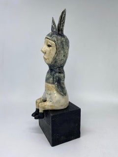 Figurative Ceramic Sculpture: 'Black Rabbit leaving Fear, black bird is Free'
