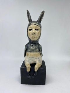 Figurative Ceramic Sculpture: 'Black Rabbit leaving Fear, black bird is Free'