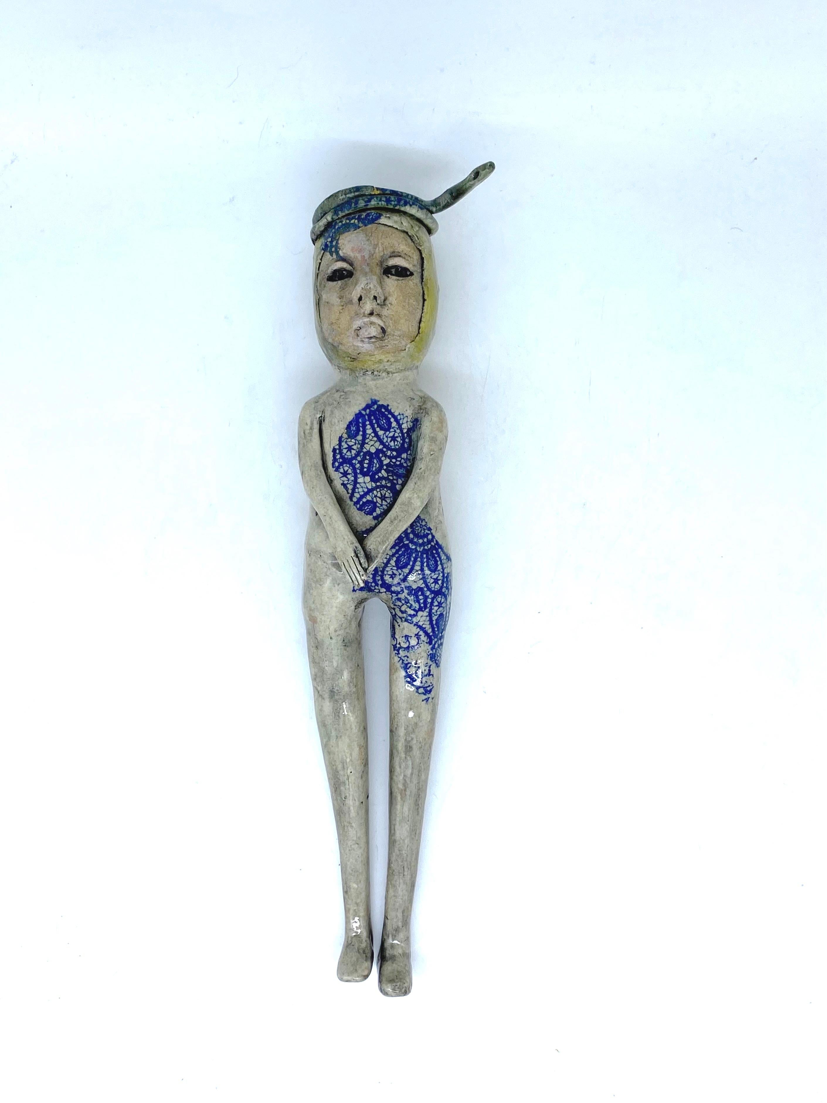 Ashley Benton Figurative Sculpture - Hanging ceramic sculpture: She got over her fear of snakes and found a good man