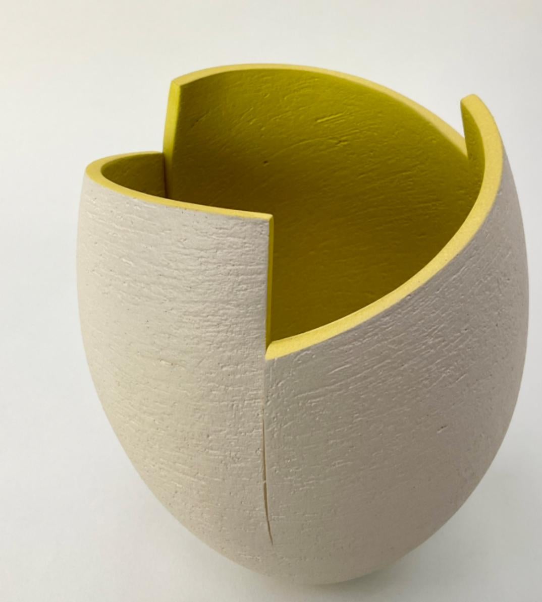 Grey cut and altered vessel with chartreuse interior - Sculpture by Ashraf Hanna
