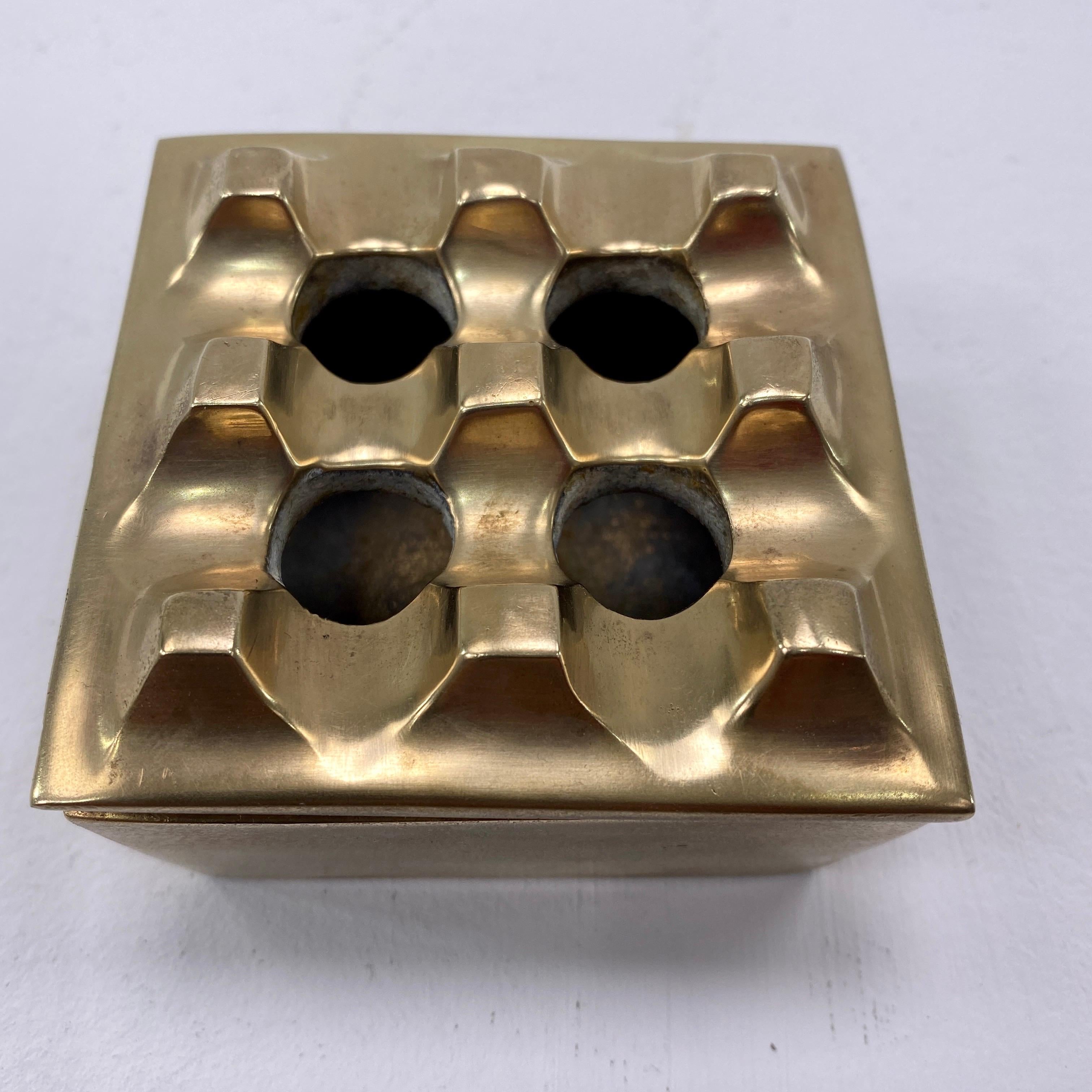 This ashtray is in solid brass. The Artists are Beck and young. It has been done in Sweden in the 1970's.