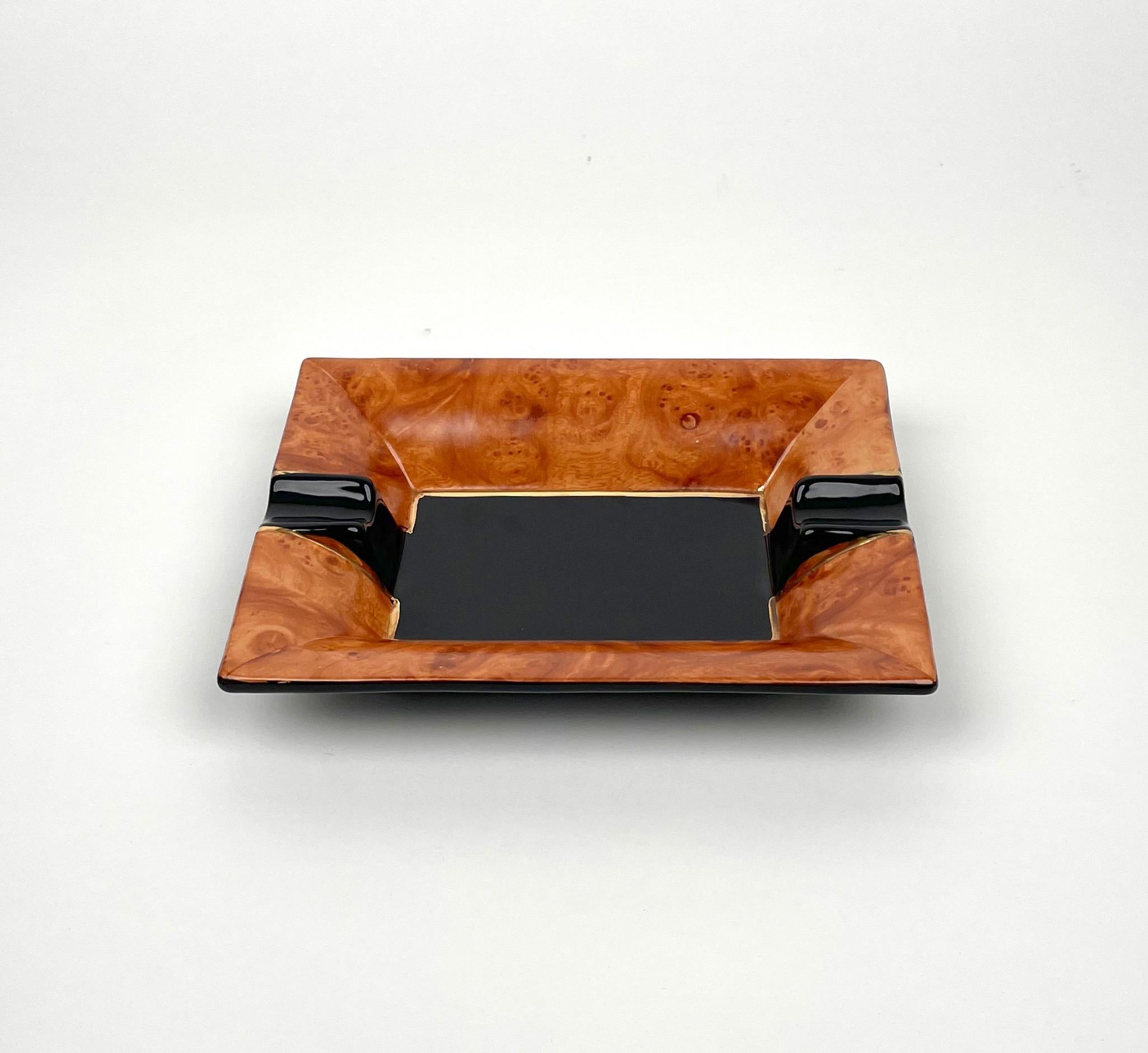 Rectangular ashtray in ceramic by Tommaso Barbi for B Ceramiche made in Italy in the 1970s.

The original label is still attached on the bottom, as shown in the photos.