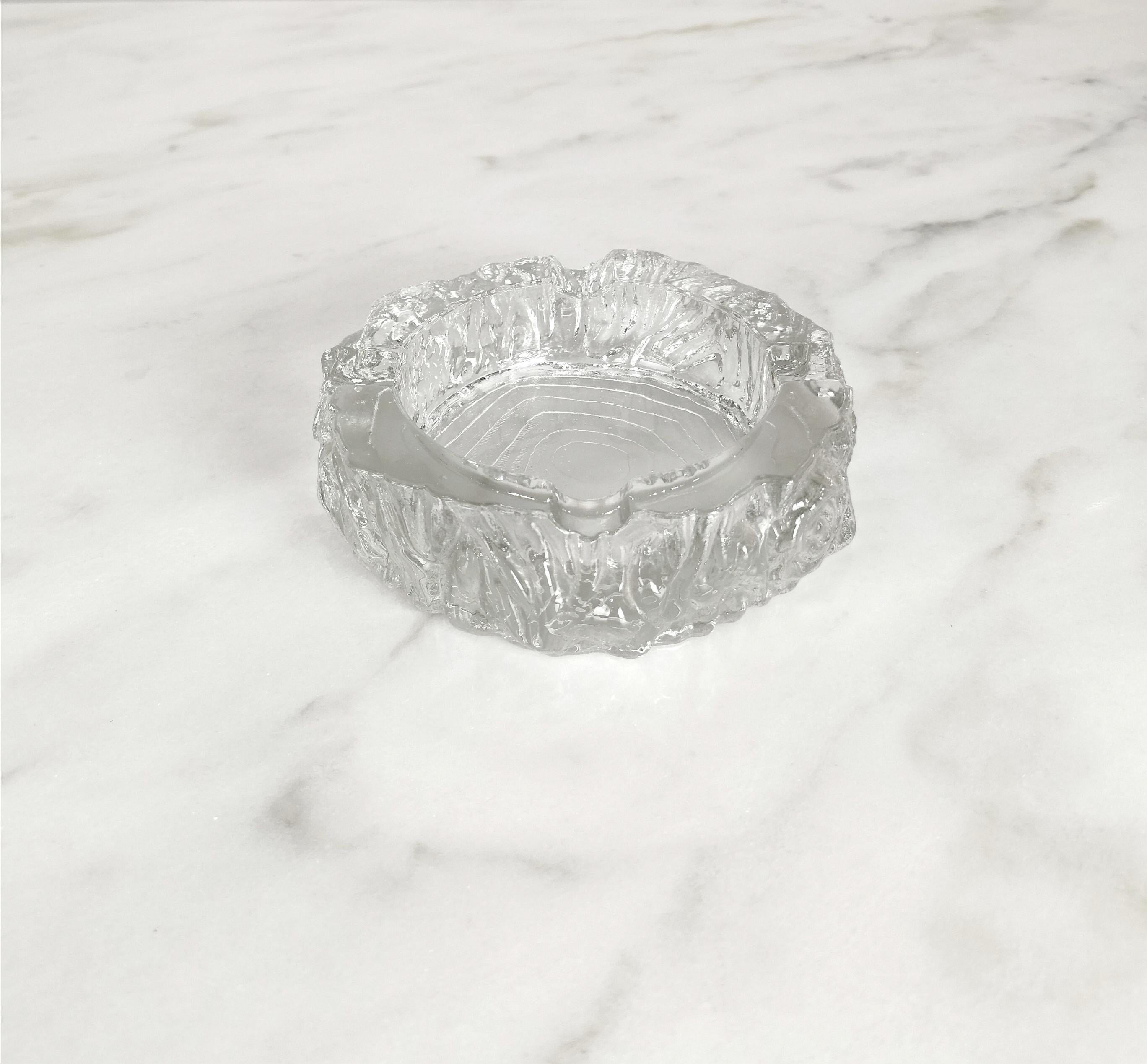 Ashtray produced in Italy in the 70s.
The circular ashtray was made of transparent Murano glass with a particular technique that gives a 