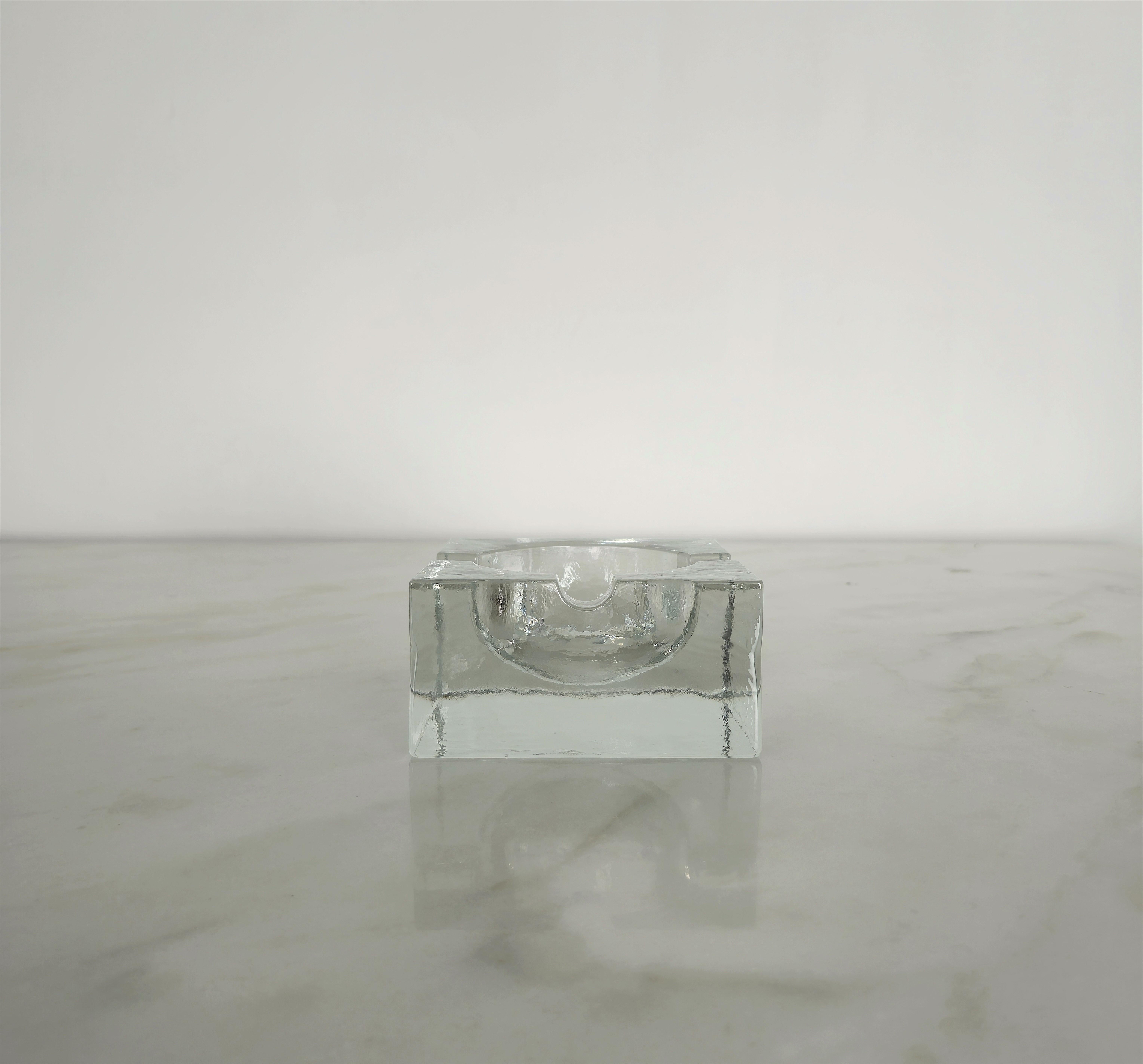 Square-shaped ashtray in transparent solid glass. Made in Italy in the 70s.



Note: We try to offer our customers an excellent service even in shipments all over the world, collaborating with one of the best shipping partners, DHL, with very fast