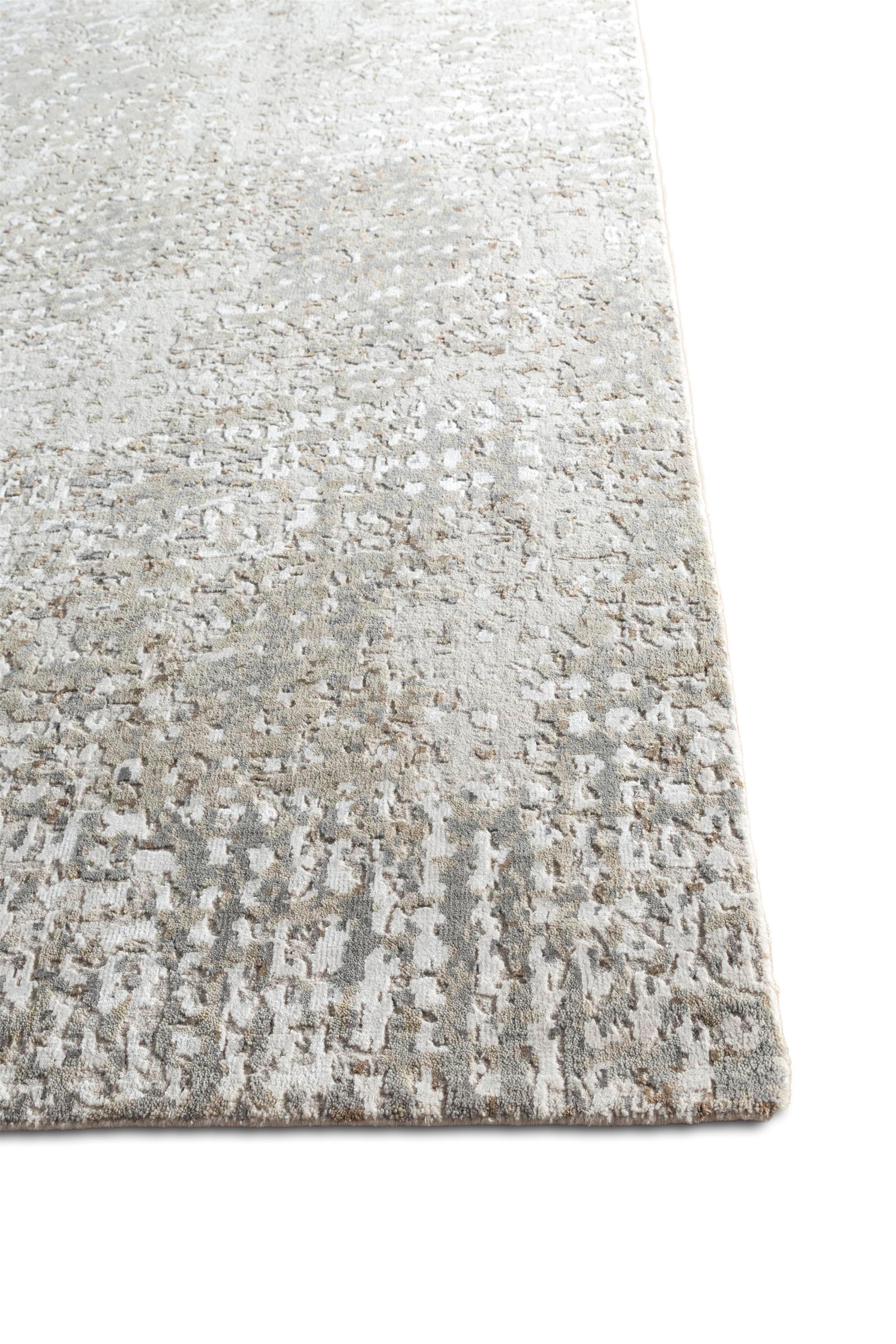 Step into a realm where the elegance of contemporary design gracefully intertwines with the essence of traditional craftsmanship. Our hand-knotted rugs are not just floor coverings; they are masterpieces. Meticulously crafted by expert weavers in