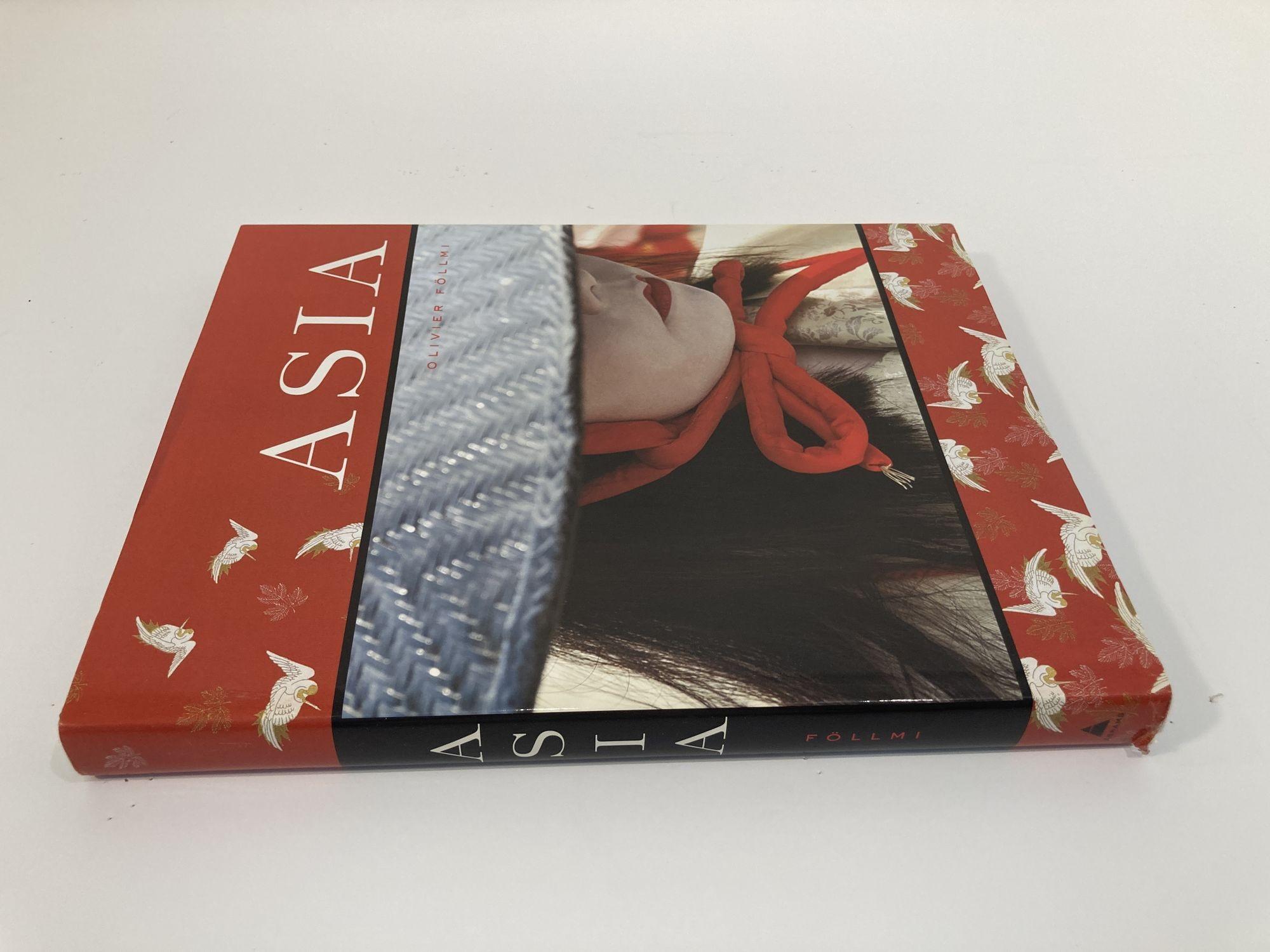 ASIA by Olivier Follmi Large Hardcover Book.
Very large format, heavy coffee table book, beautiful.
Inspired by the beauty of distant countries, Asia celebrates the depth and grandeur of the Far East. The fourth volume in Abrams' album-size