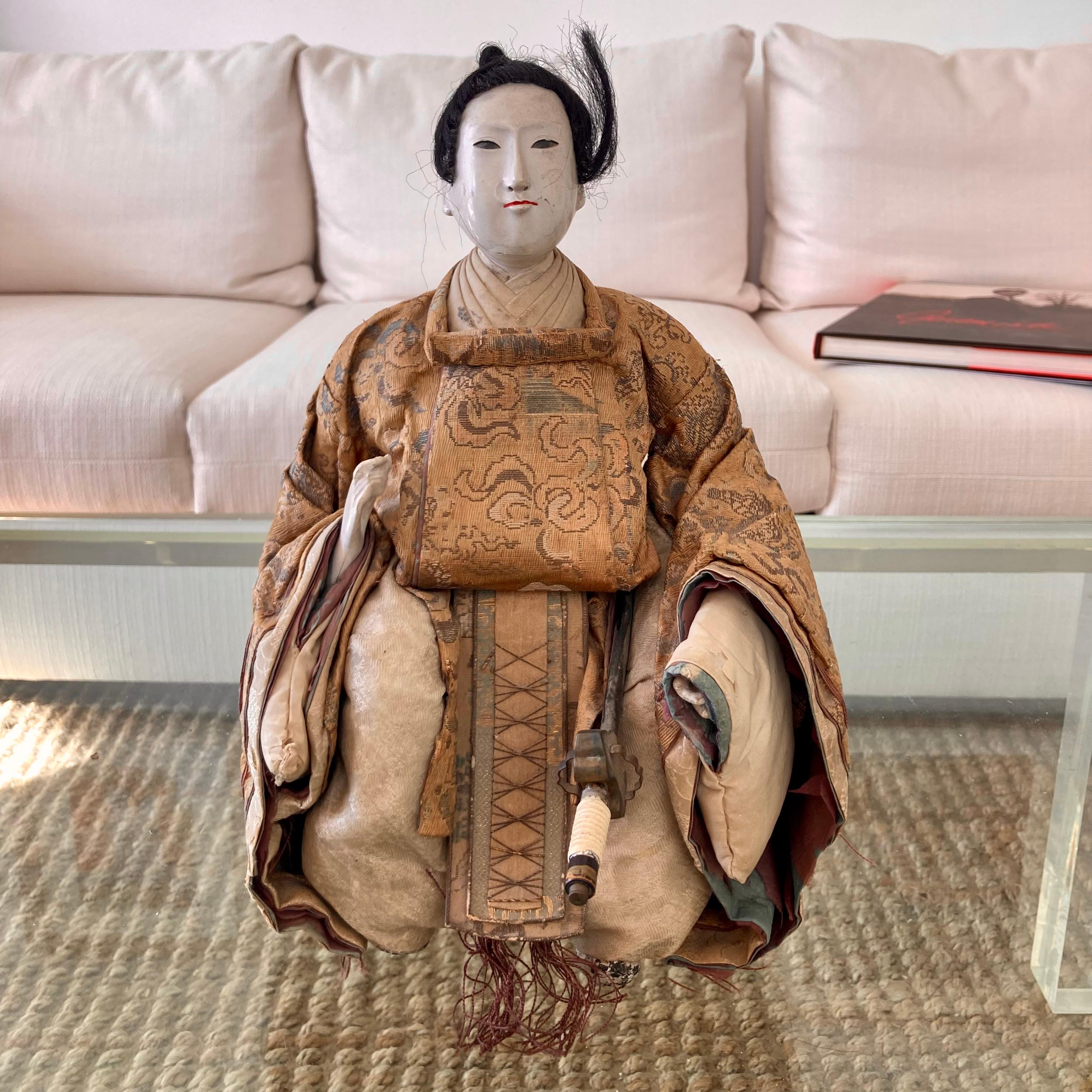 Beautiful Asian 19th Century Ningyo doll. Great addition to your Asian inspired interiors and table tops.