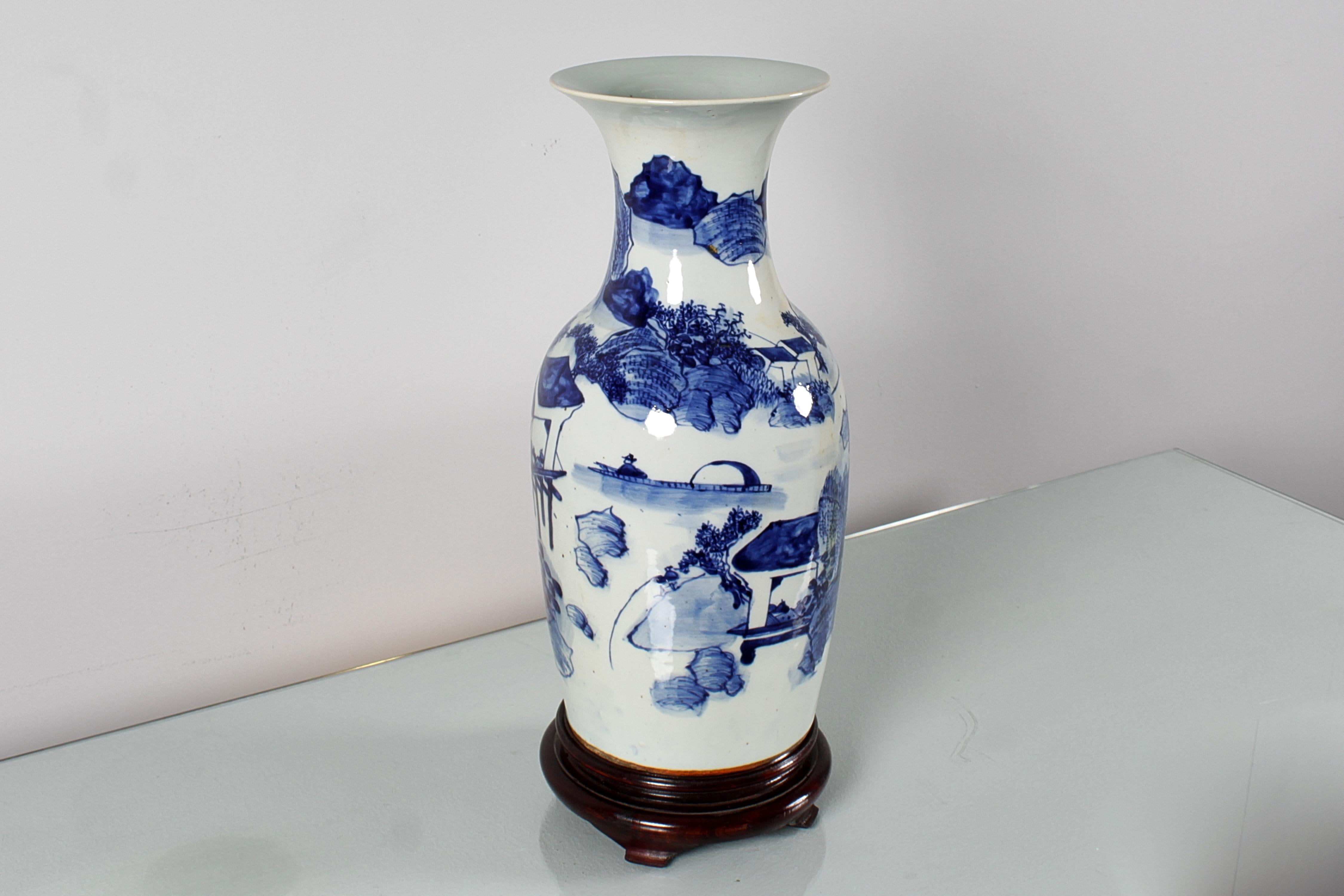 Asian art, hand-painted blue and white porcelain vase, depicting elements of nature and fishing scenes. China, presumably Qing dynasty, 19th century. Wear consistent with age and use.