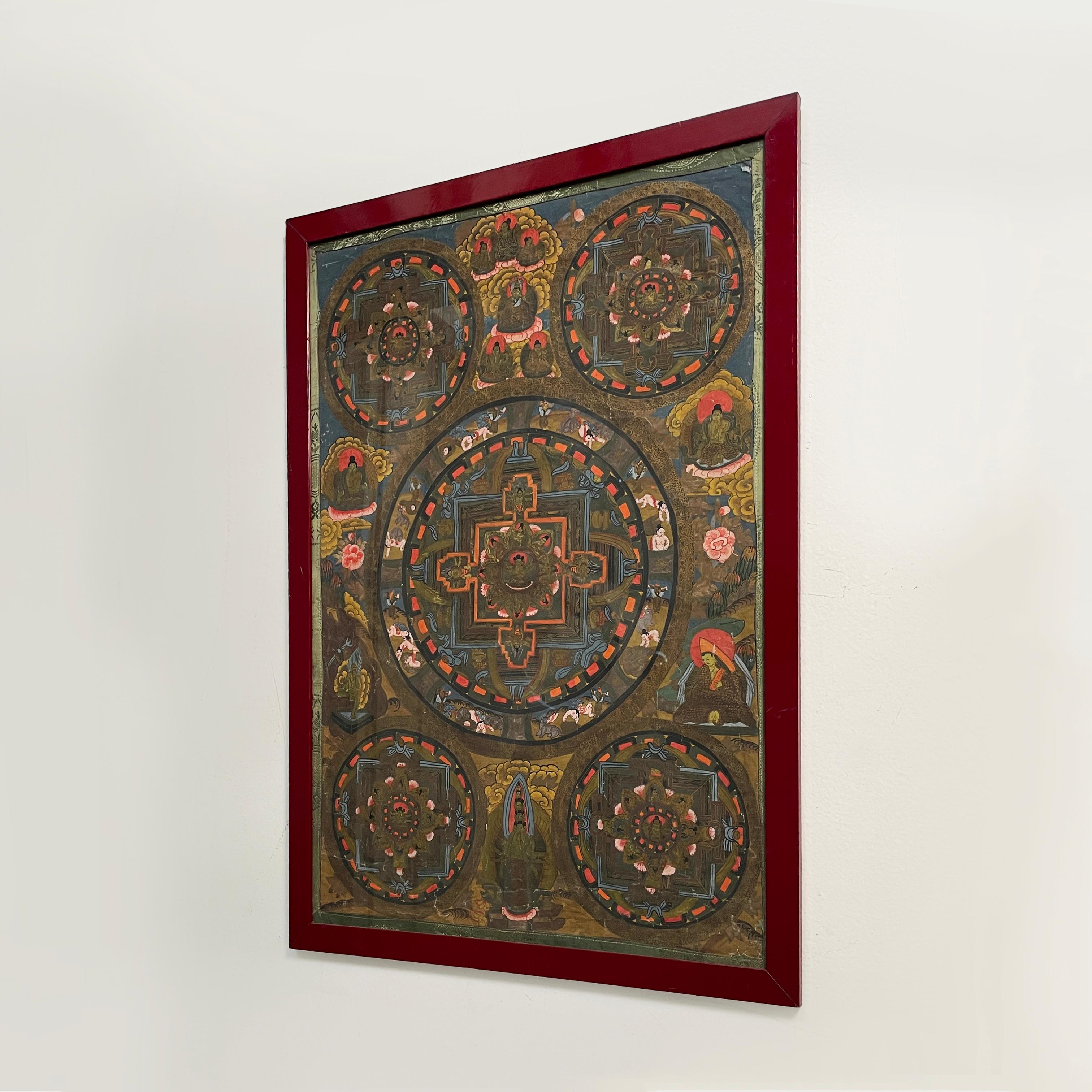Asian Batik painting of Indian religion in wood frame, 1900-1990s
Painting painted with the batik technique on fabric. The structure of the painting is divided into 5 circles, one at each corner plus a central one. In each circle and between the