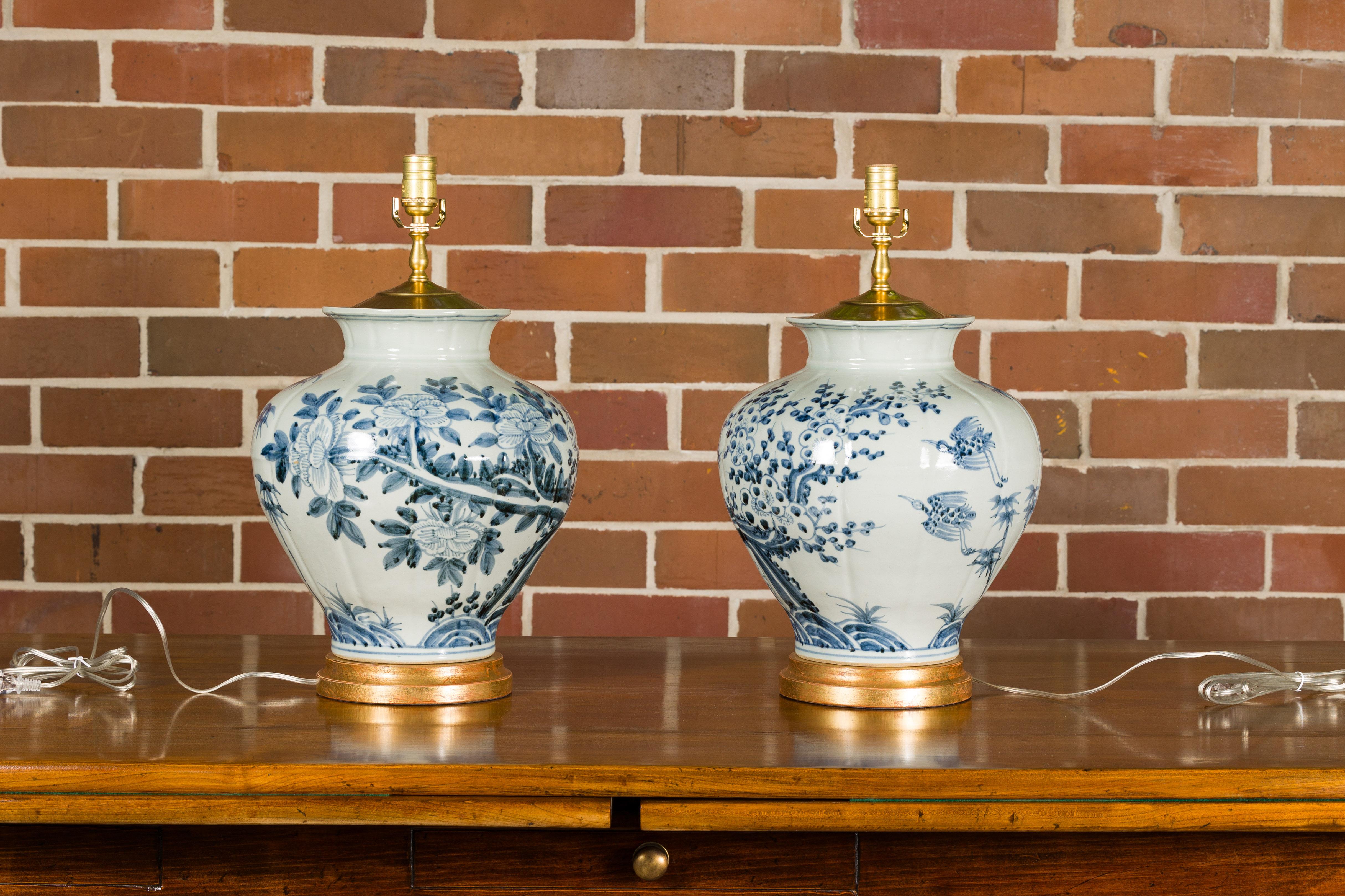 Asian Blue and White Porcelain Table Lamps with Blooming Trees, a Pair In Good Condition In Atlanta, GA