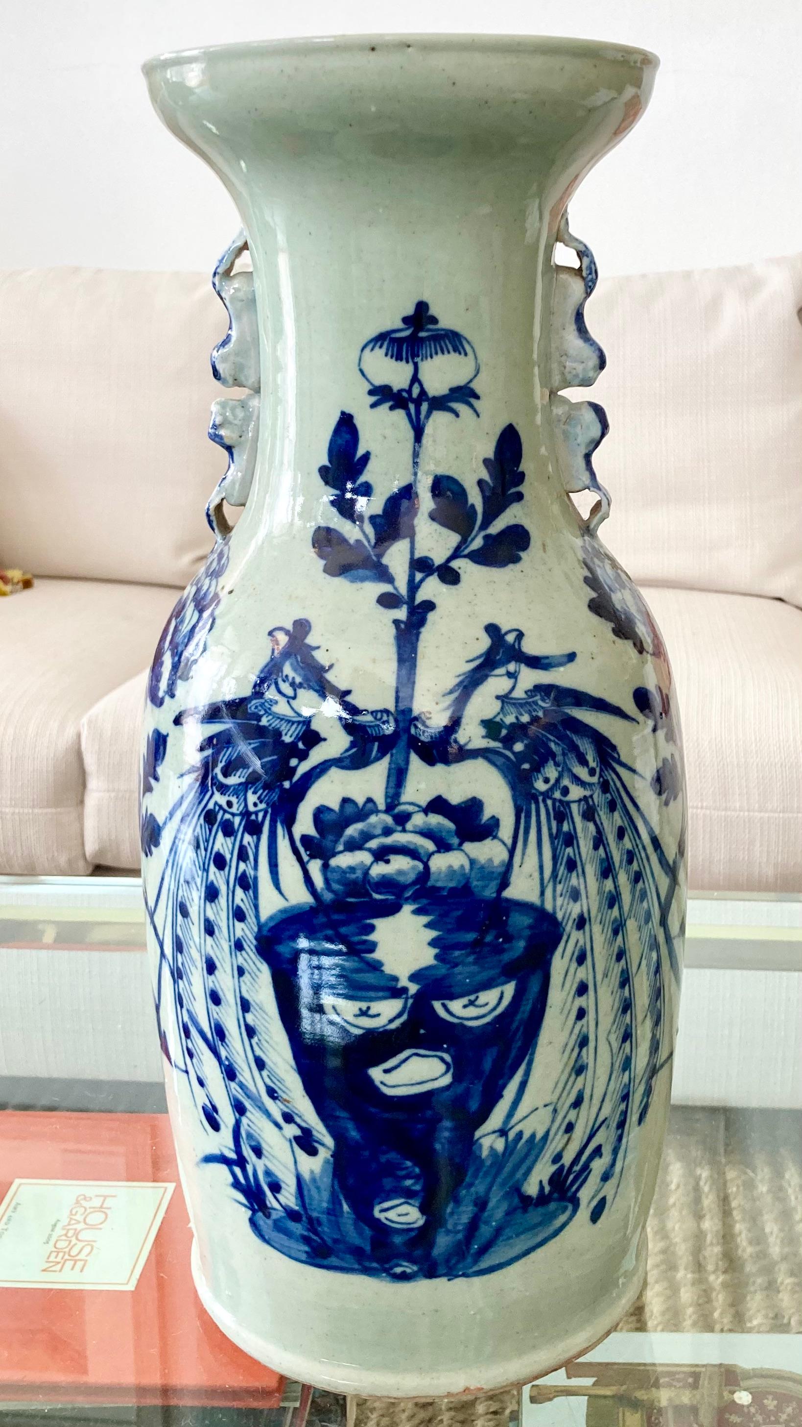 Beautiful Asian blue and white ( celadon green tint) ceramic vase. Great addition to your interiors and table tops. No stamp at base. Very stylish form , pattern , and color combinations.