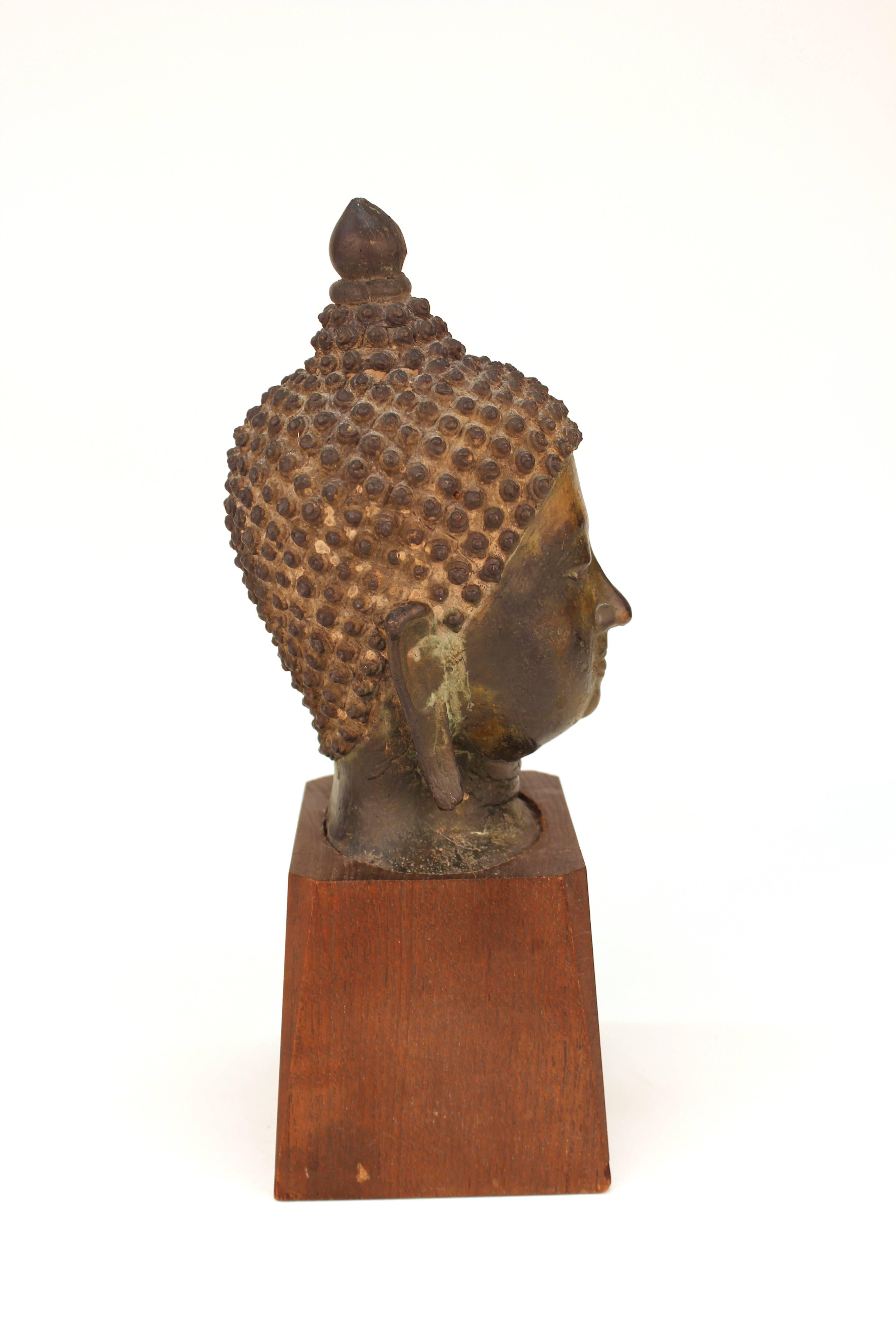 Asian Bronze Head of Shakyamuni Buddha on Wood Base In Good Condition In New York, NY