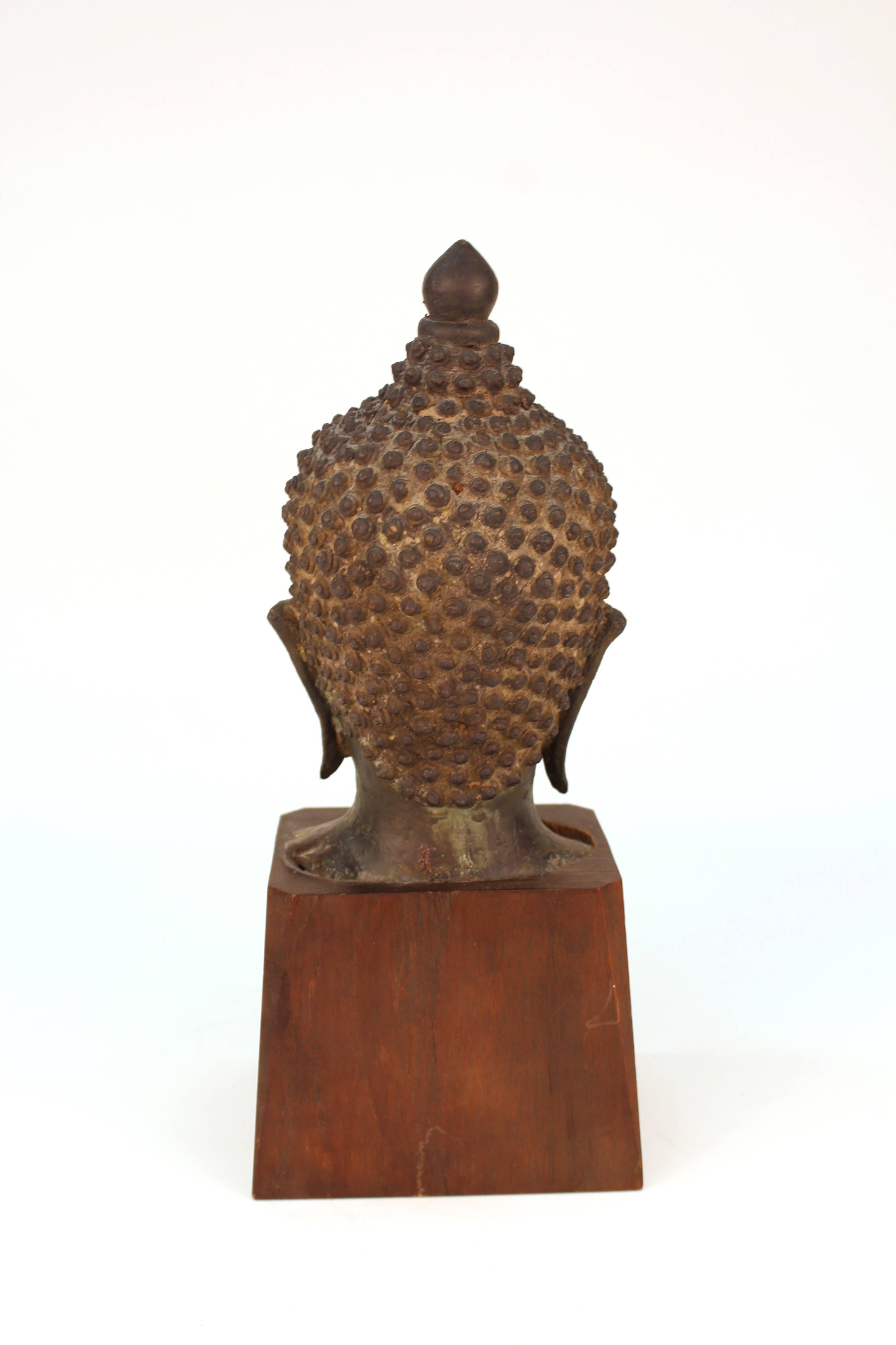 19th Century Asian Bronze Head of Shakyamuni Buddha on Wood Base