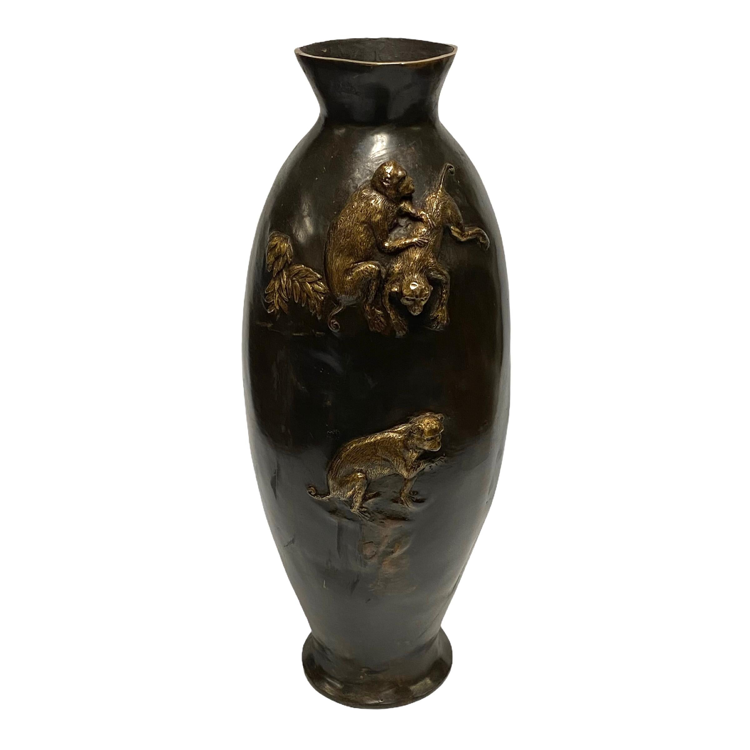 Asian bronze vase with Monkeys in Relief.