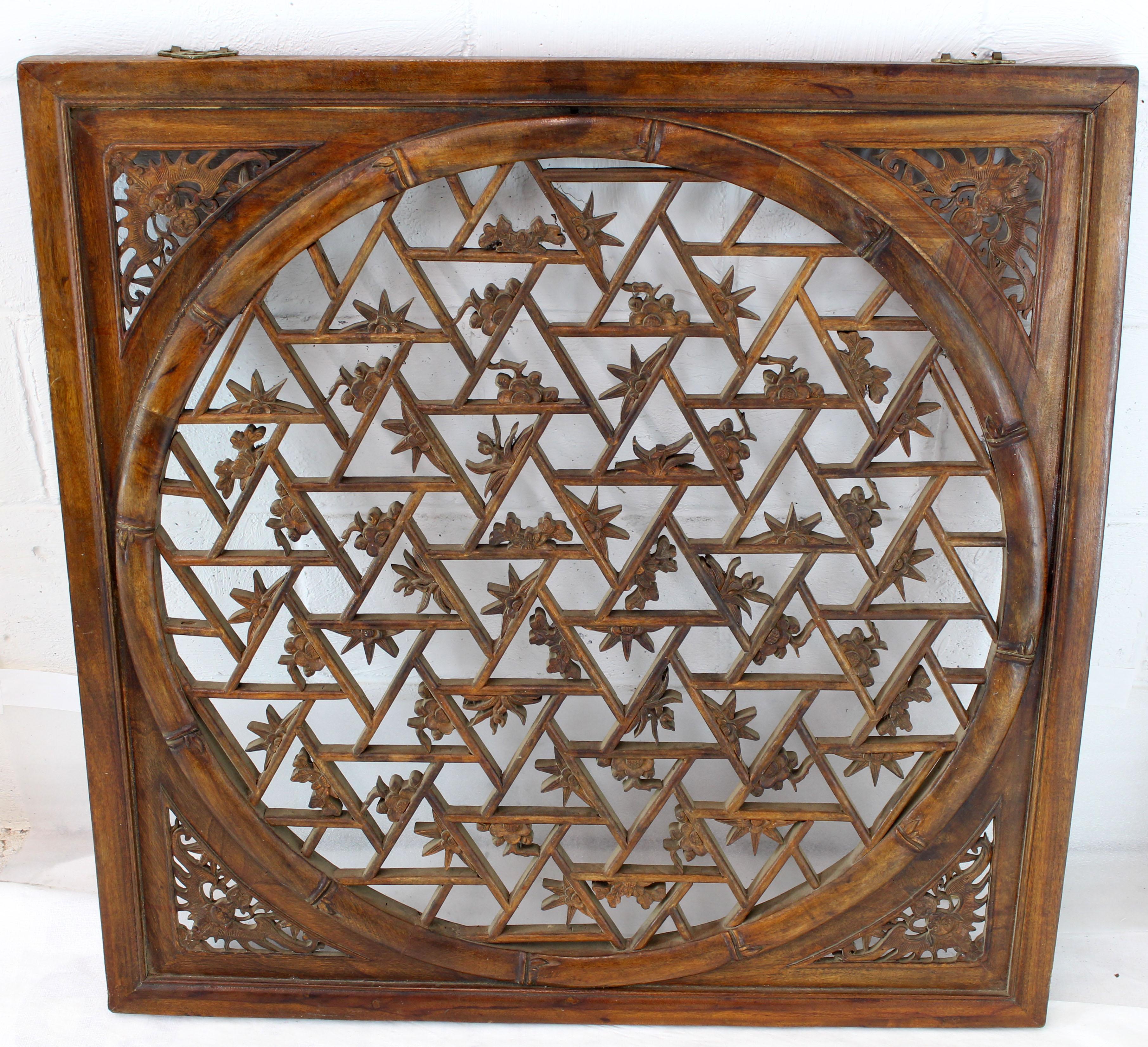 Oriental carved teak square wall panel.
