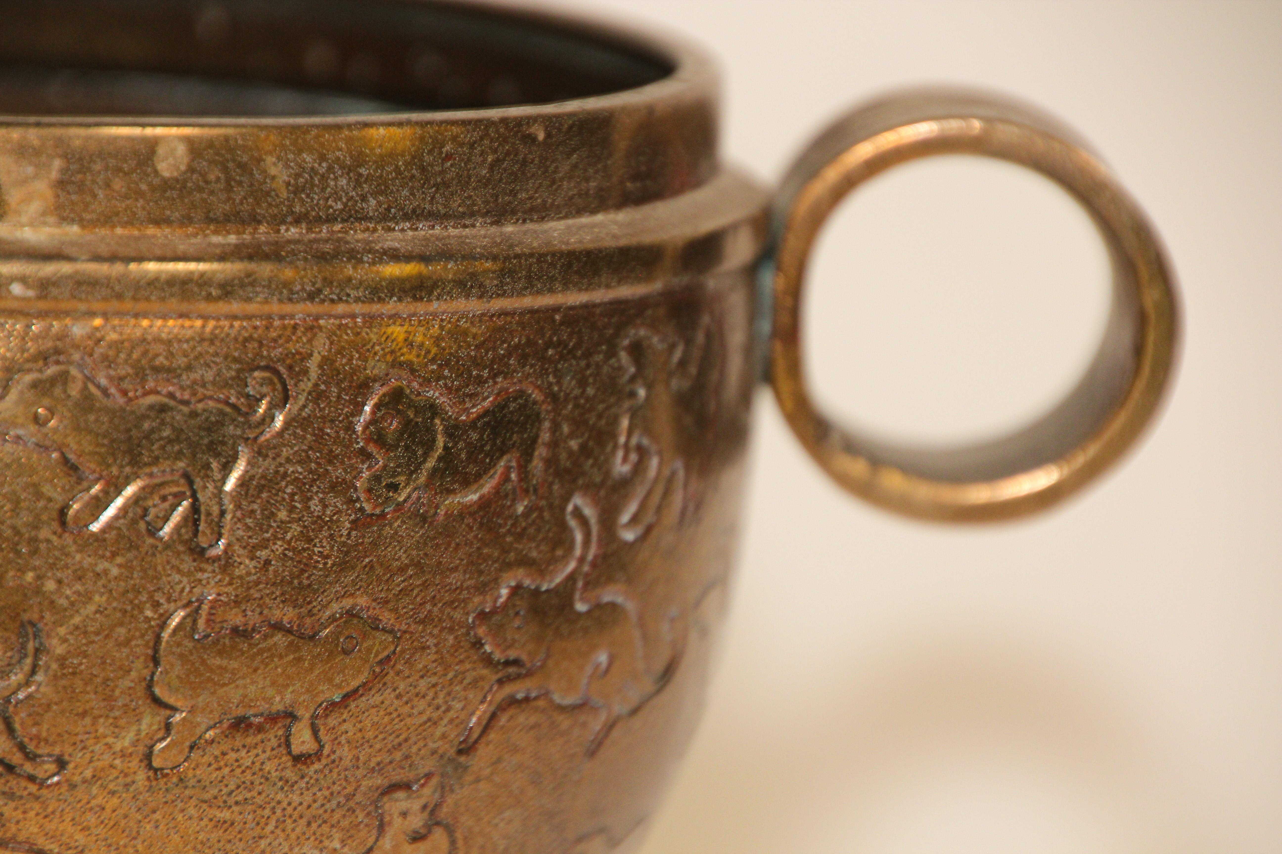 Asian Cast Brass Footed Vessel with Animals Designs In Good Condition For Sale In North Hollywood, CA