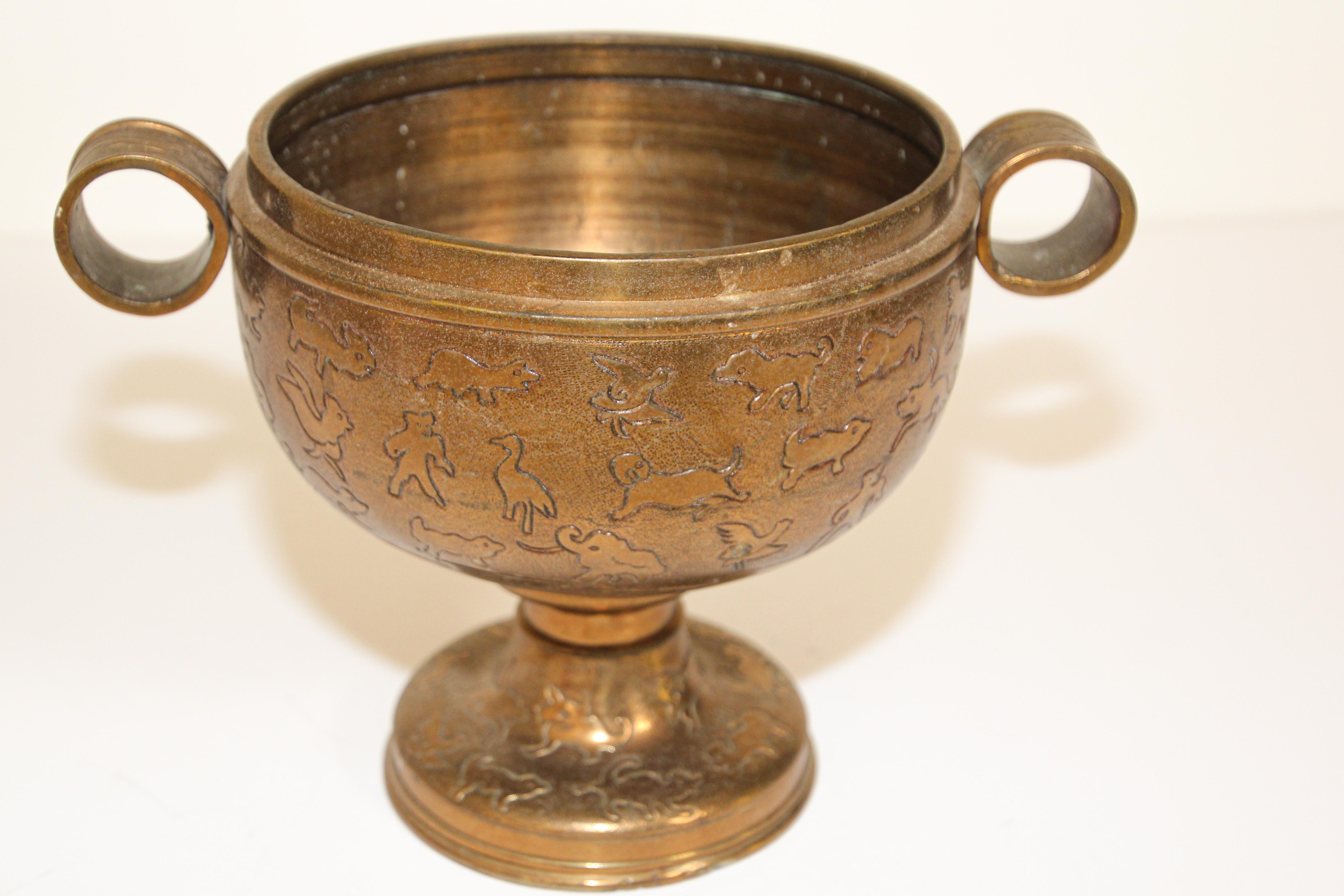 20th Century Asian Cast Brass Footed Vessel with Animals Designs For Sale