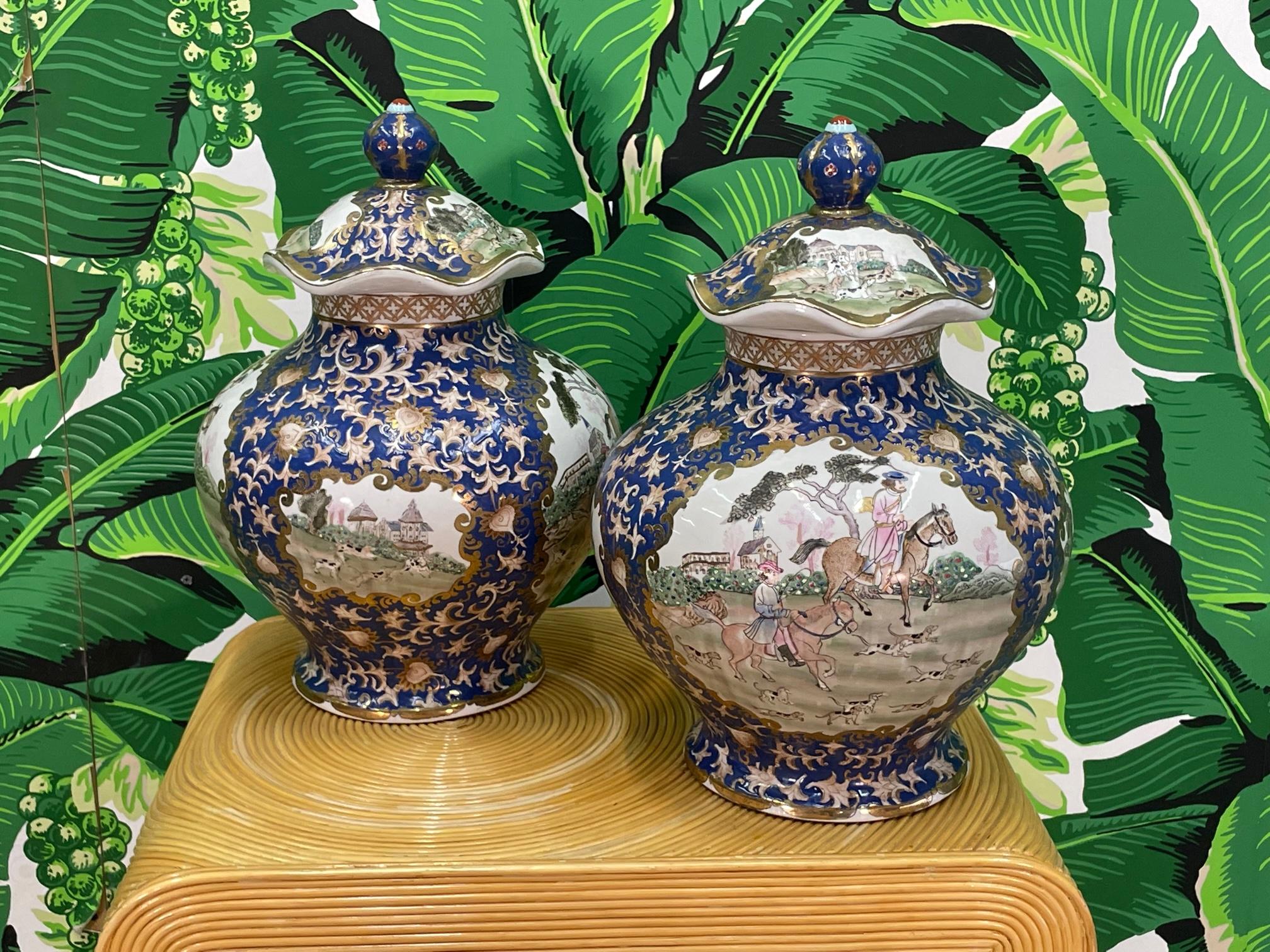 Pair of Asian baluster jars with lids feature bold, colorful hand painted artwork with a glossy glazed finish. Maker's mark present on bottom. Good condition with no chips or cracks. 
For a shipping quote to your exact zip code, please message us.
