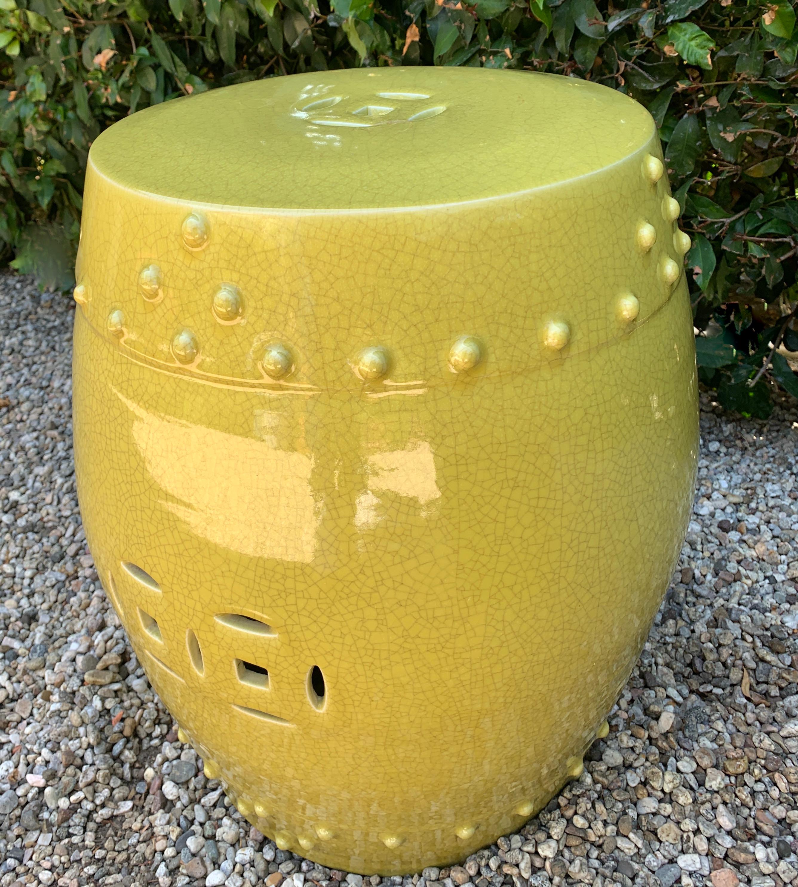 Ceramic Garden stool with Asian motif in a Chartreuse tone. A wonderful stool or side table for the garden or any room in the home.
