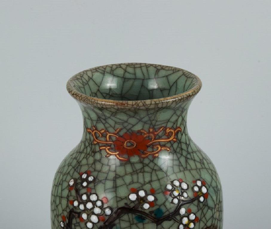 West Asian Asian Ceramic Vase, Hand-Painted with Classic Floral Motif For Sale