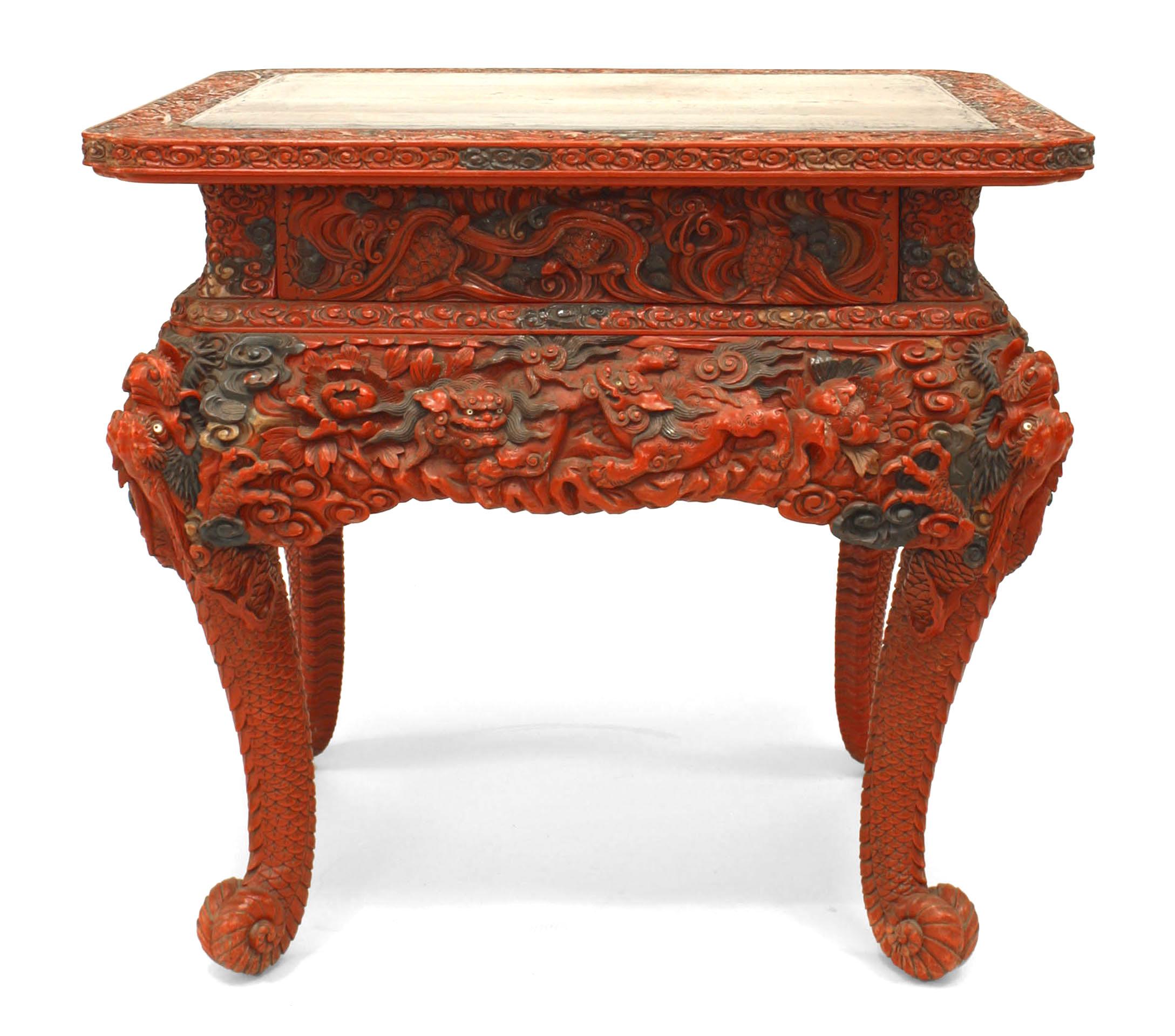 Asian Chinese-style (19th Century) red lacquered rectangular 2 drawer tea table with black lacquered top and carved legs and border.
