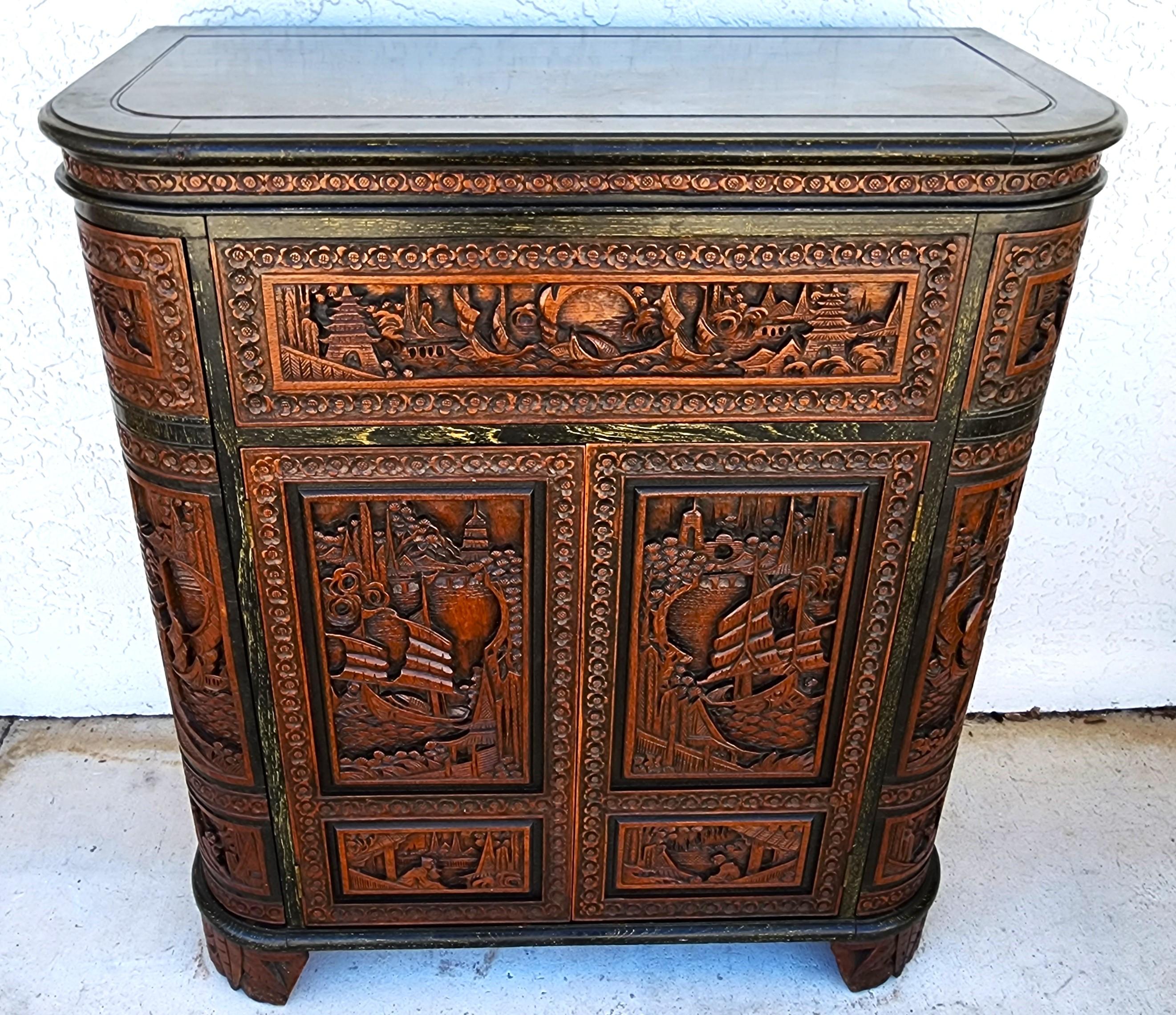 For FULL item description click on CONTINUE READING at the bottom of this page.

Offering One Of Our Recent Palm Beach Estate Fine Furniture Acquisitions Of A
George Zee Mid-Century Hand-Carved Asian Chinoiserie Bar Cabinet Rosewood Flip