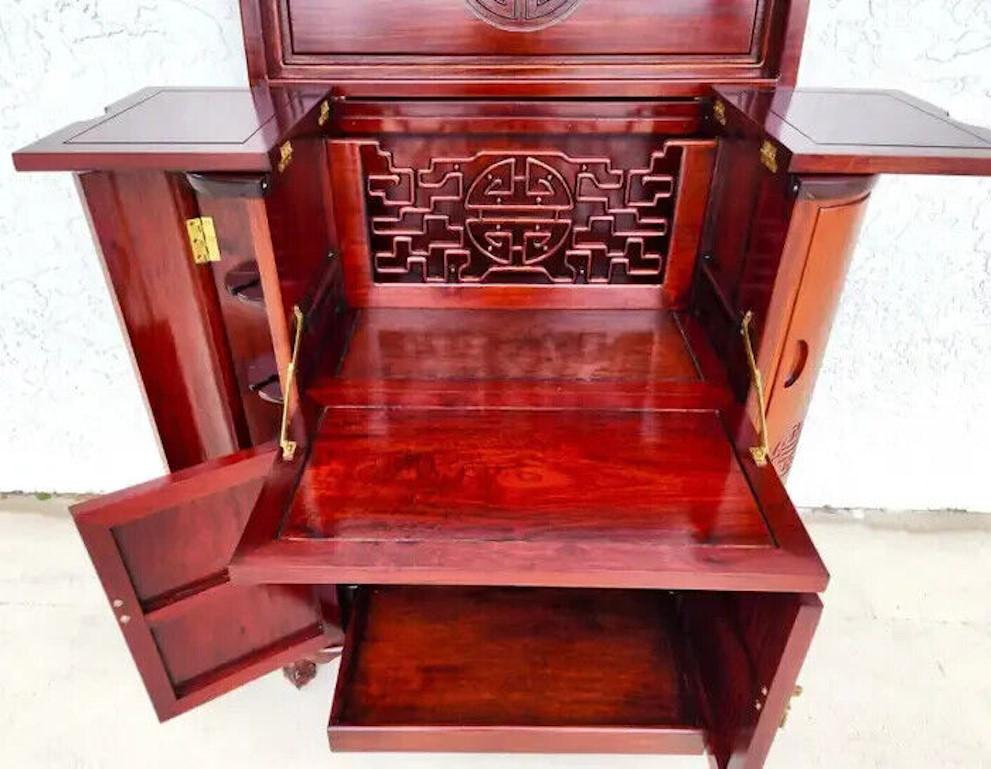 For FULL item description click on CONTINUE READING at the bottom of this page.

Offering One Of Our Recent Palm Beach Estate Fine Furniture Acquisitions Of A
Vintage 1907s Asian Chinoiserie Rosewood Bar Cabinet 

Approximate Measurements in