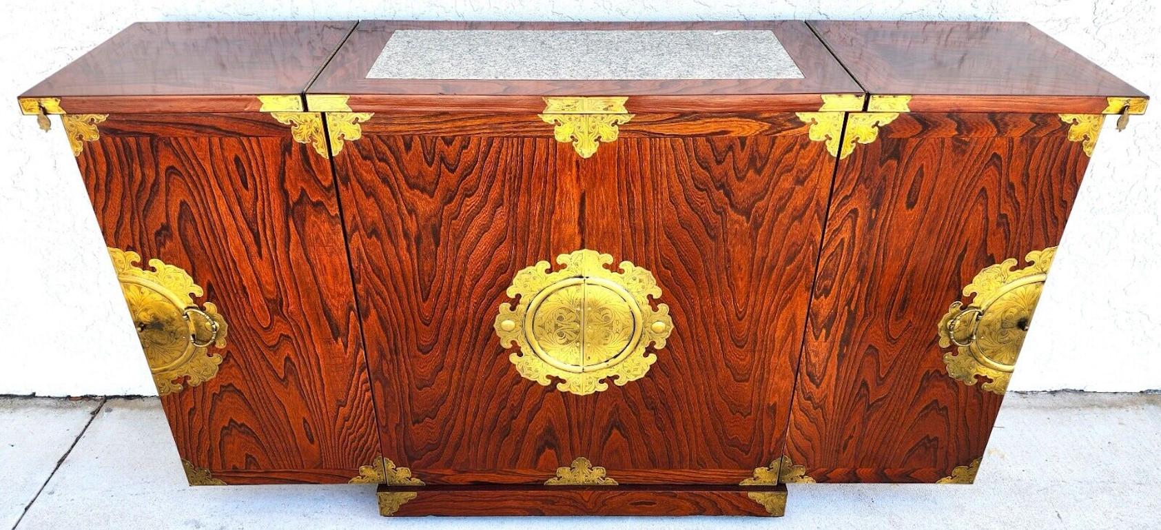 For FULL item description click on CONTINUE READING at the bottom of this page.

Offering One Of Our Recent Palm Beach Estate Fine Furniture Acquisitions Of A
Asian Chinoiserie Fold Out Expandable Rolling Dry Bar in a Rosewood Finish and a Granite