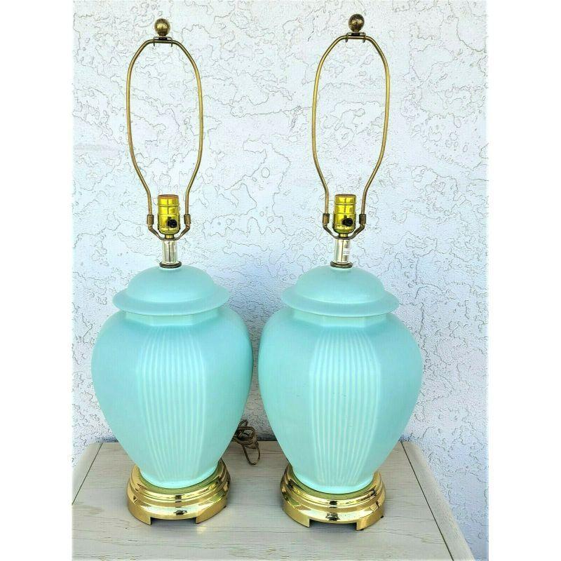Offering one of our recent palm beach estate fine lighting acquisitions of a
1980s Pair of Very High-End Asian chinoiserie Ming Ceramic Ginger Jar & Brass Base Table Lamps 
Coloration: Aqua

Approximate Measurements in Inches
30