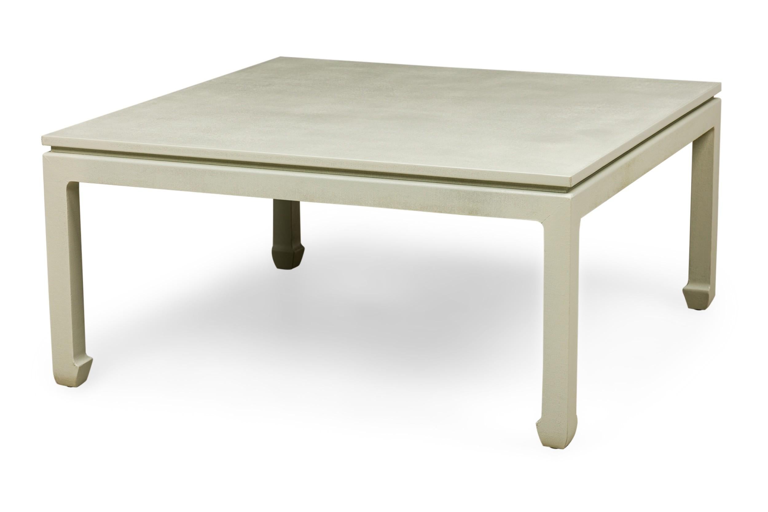 Asian contemporary Ming dynasty style raffia wrapped square coffee table with an indented apron below the top in a sage green-grey color