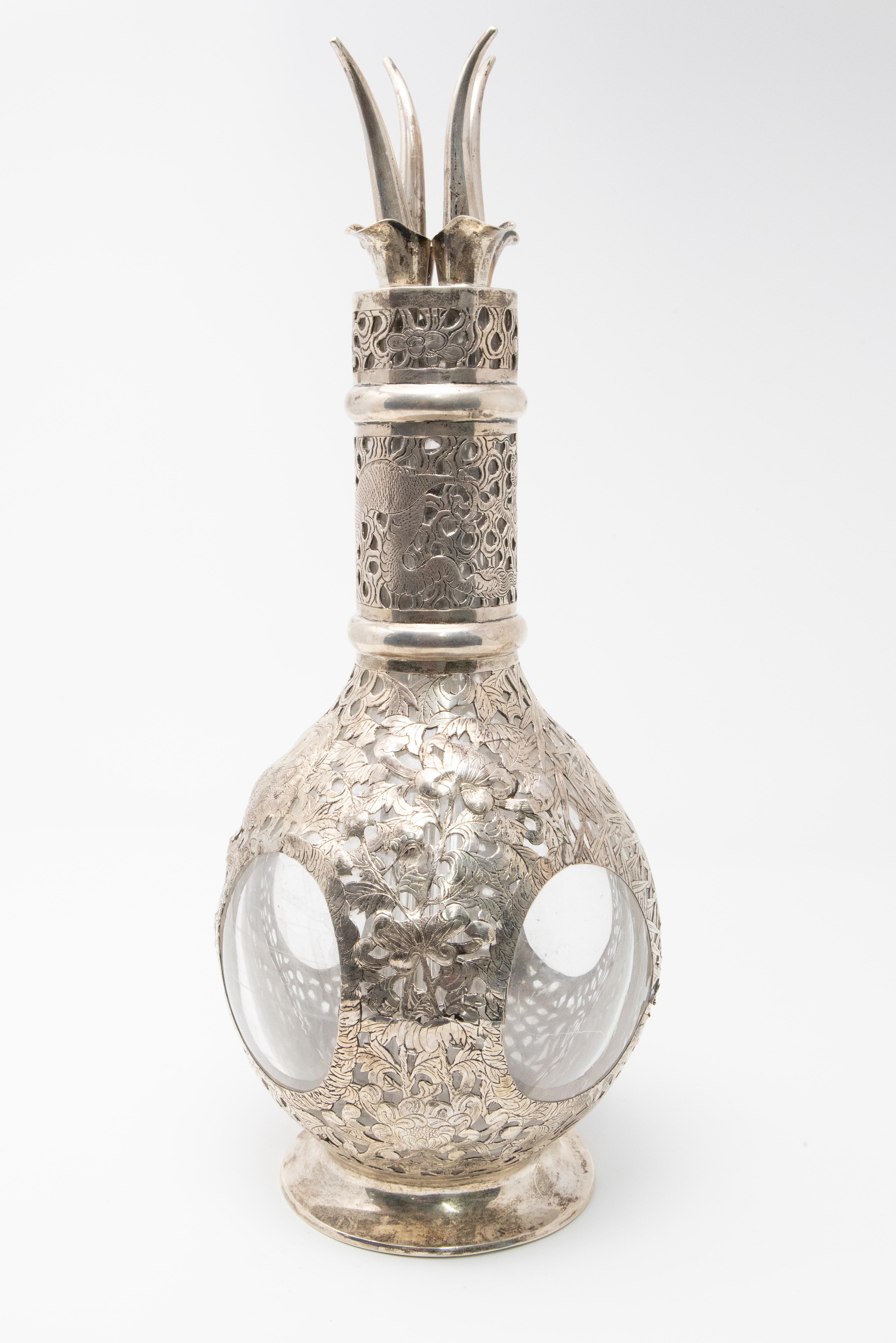 silver and glass decanter