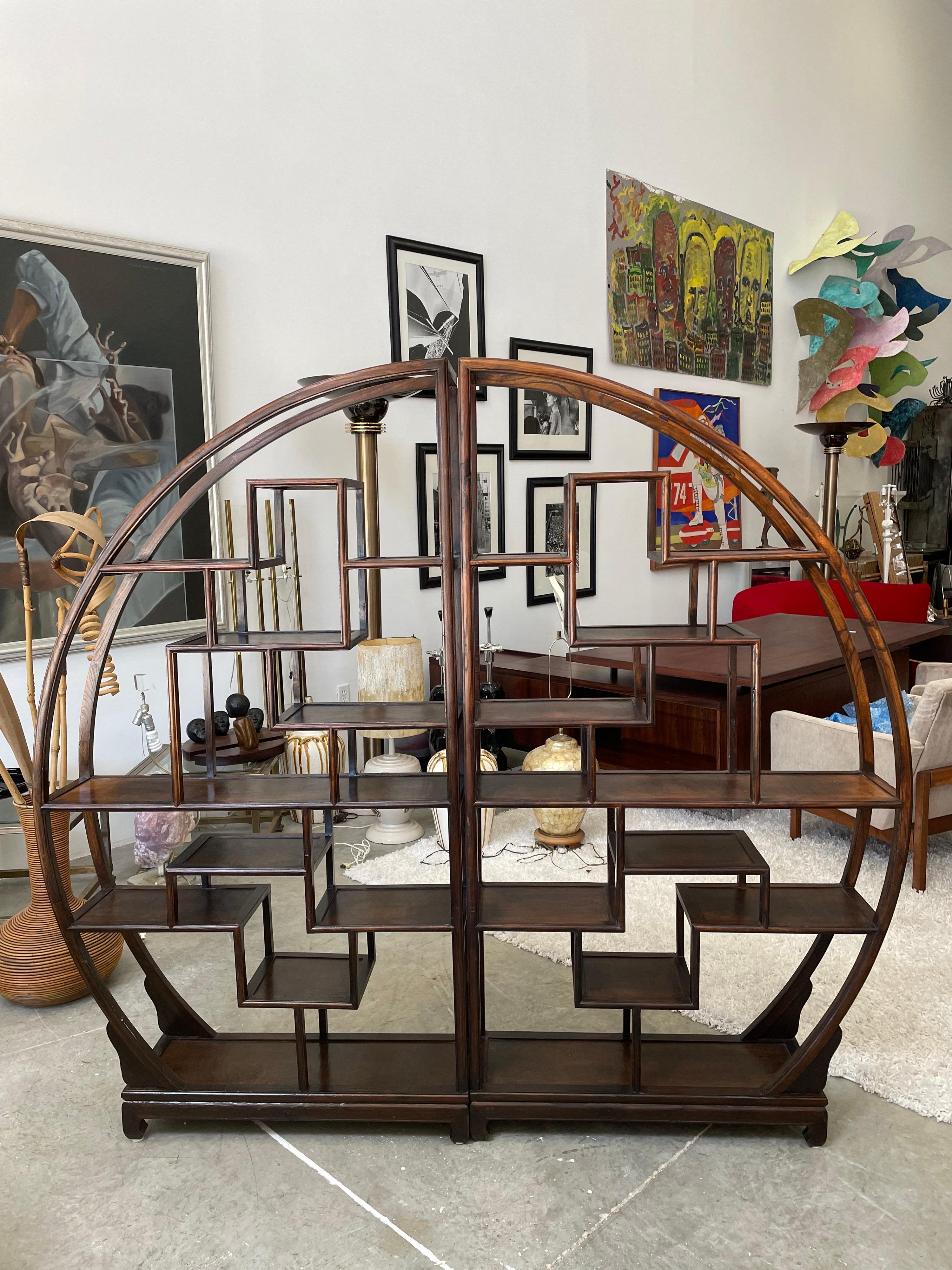 Very stylish 1960s Asian wood etagere in very good condition. This etagere would perfectly match every homestyle, thanks to its beautiful unique look surrounded with rich details.