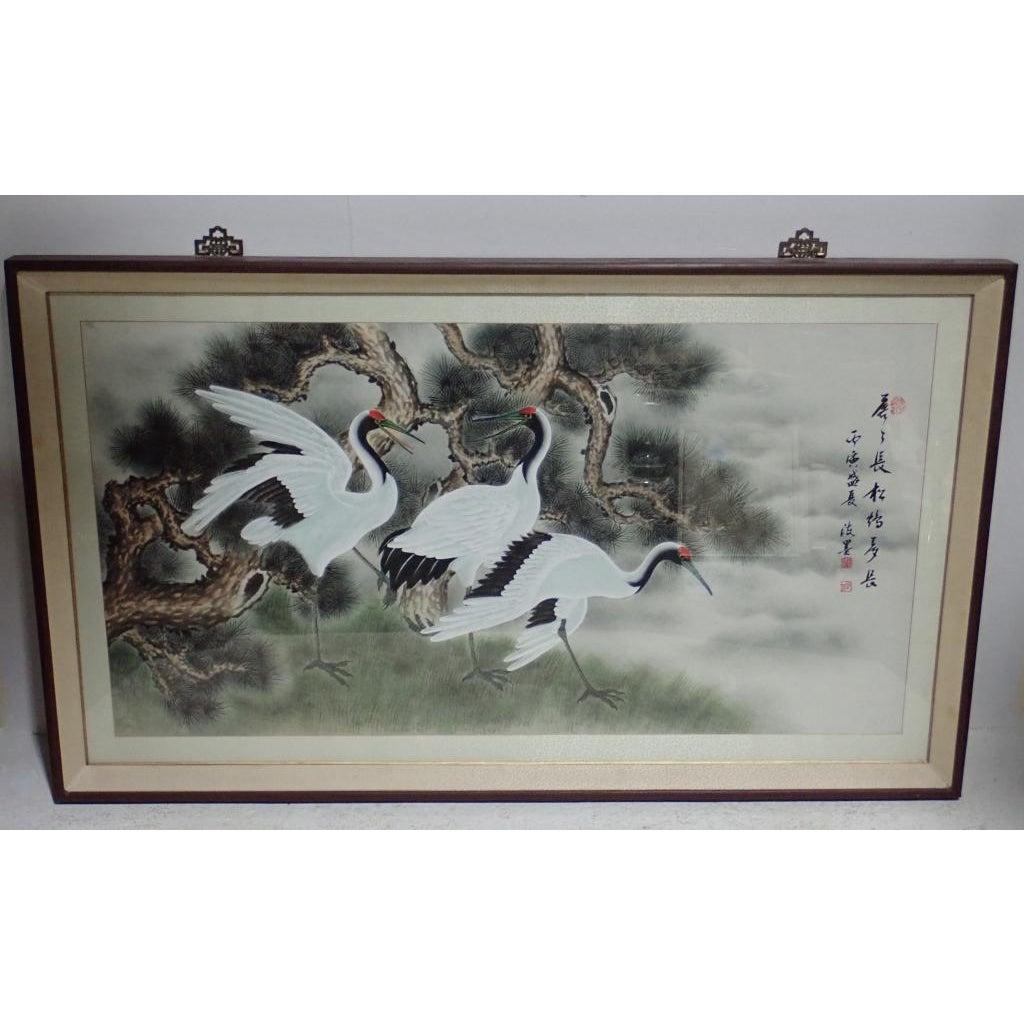 Asian Framed Crane Watercolor Painting. Large Asian/Chinese watercolor depicting cranes. Framed under glass. Red stamps/signatures.