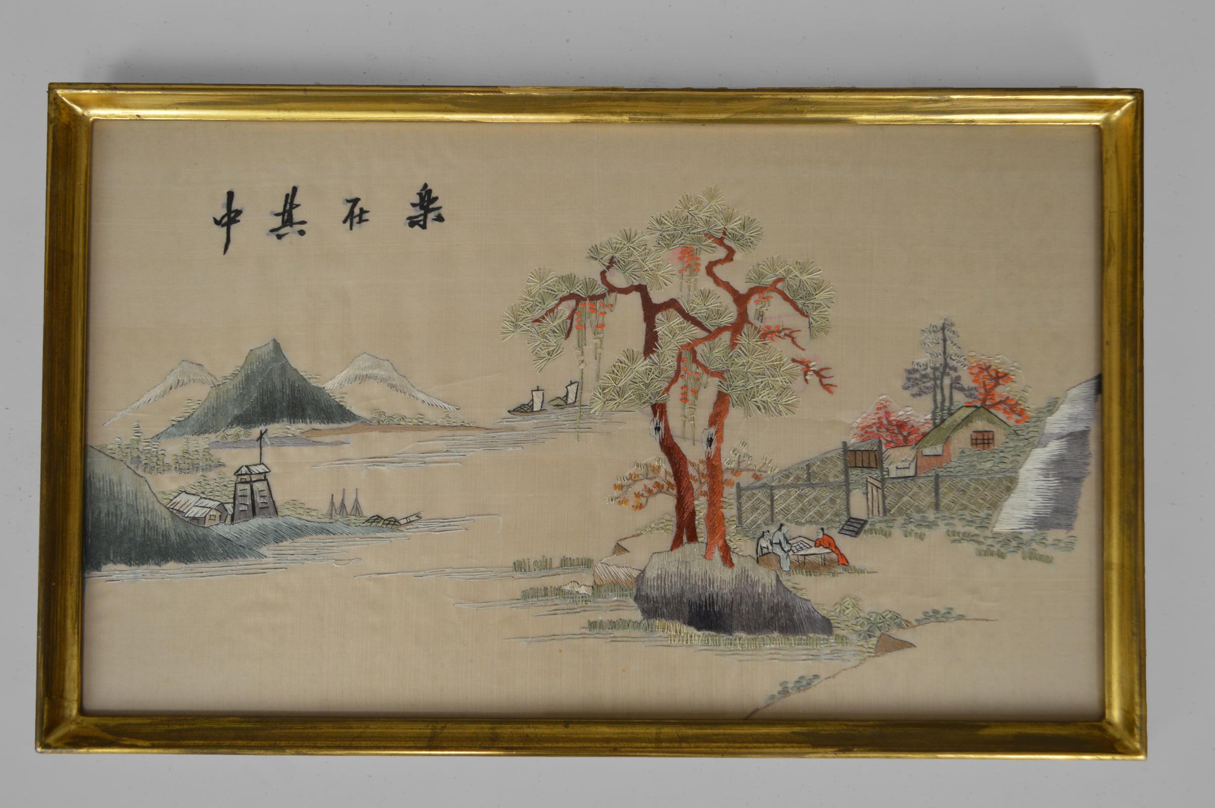 Beautiful handmade silk embroidery, framed under glass.

We see a landscape where a lake or a navigable river is represented, bordered by houses, forests and mountains.

Asia, old Indochina (Vietnam) or South China, early 20th century.

In very good