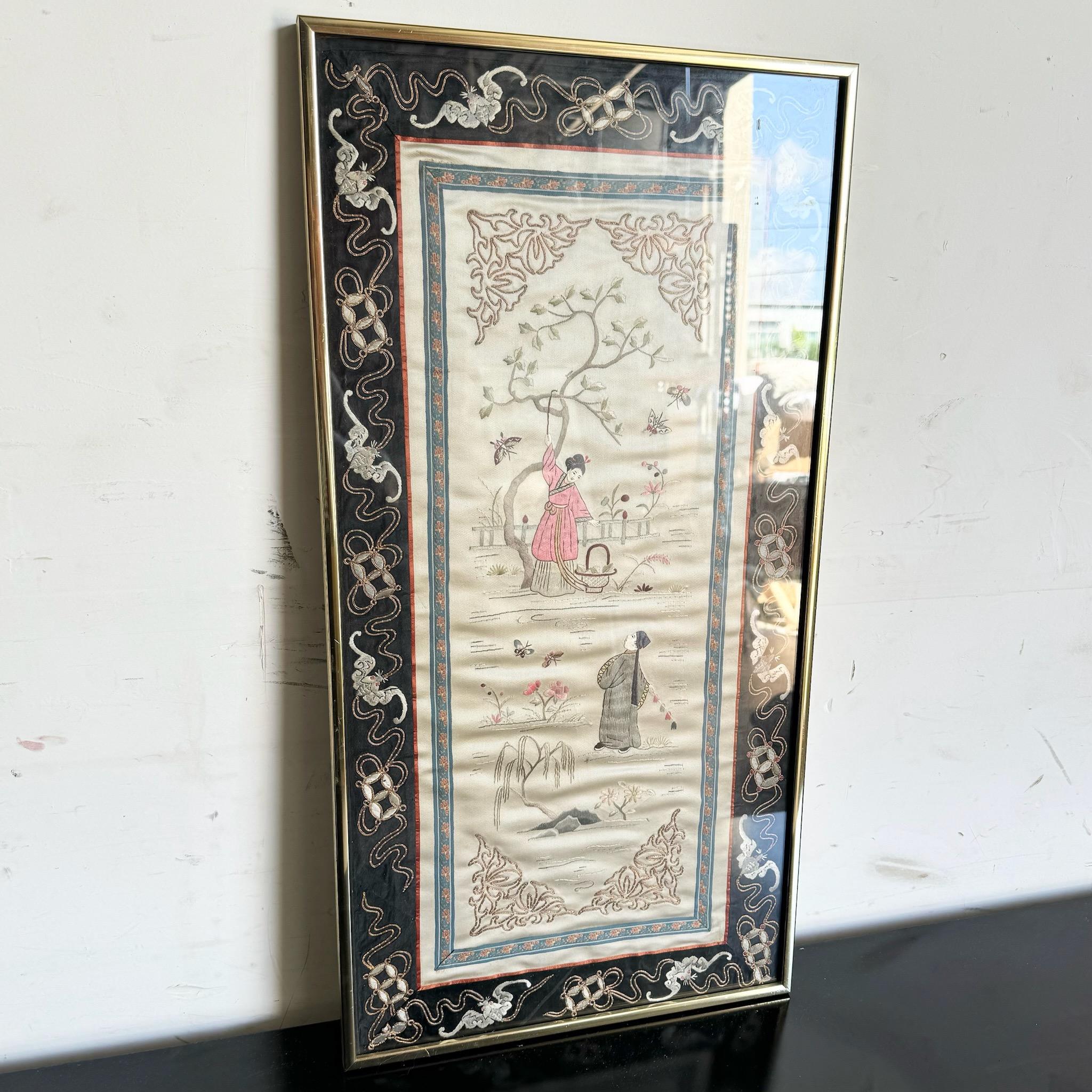 Enhance your space with this exquisite Asian framed silk embroidery. This beautifully crafted piece showcases intricate needlework, capturing the elegance and artistry of traditional Asian design. Perfect for adding a touch of cultural