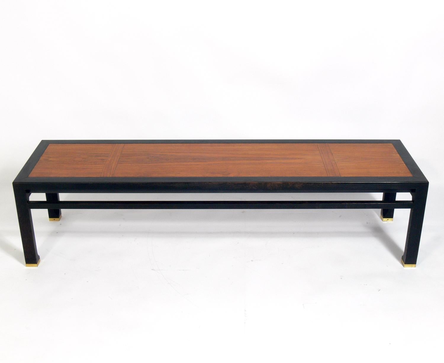 Asian influenced or chinoiserie coffee table, designed by Michael Taylor for Baker, American, circa 1960s. This table is currently being refinished and will look incredible when completed. The price noted includes refinishing.