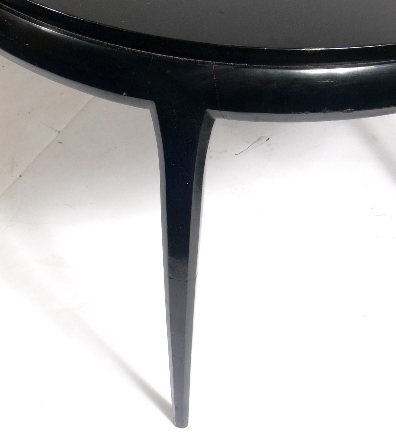 Asian inspired midcentury dining table, originally retailed through John Stuart NYC, American, circa 1960s. Elegant tapered legs. This table is currently being refinished and can be completed in your choice of color. The price noted below includes