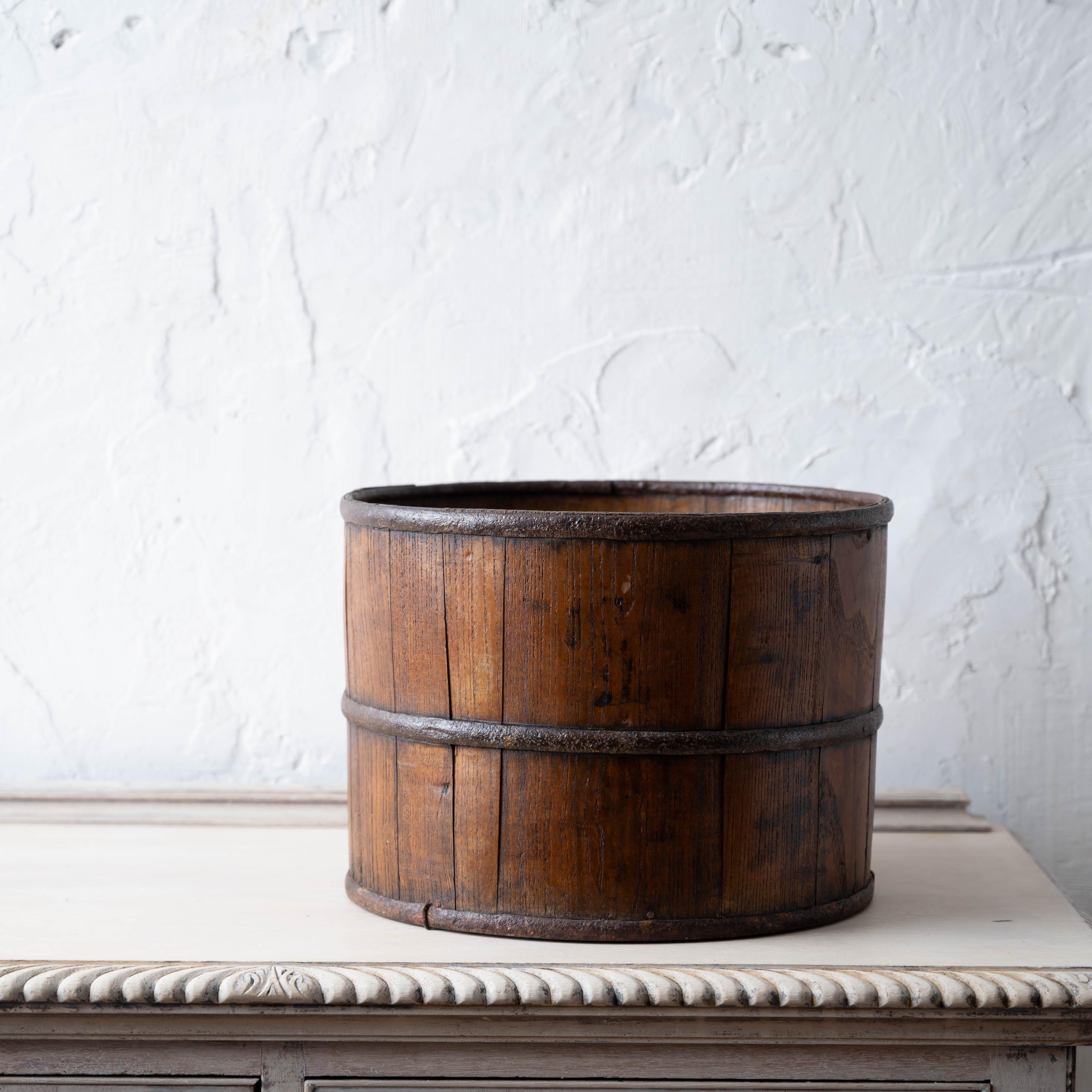 An asian iron and wood coopered bucket, 19th century.



12 ½ inches iwde by 9 ¼ inches tall



