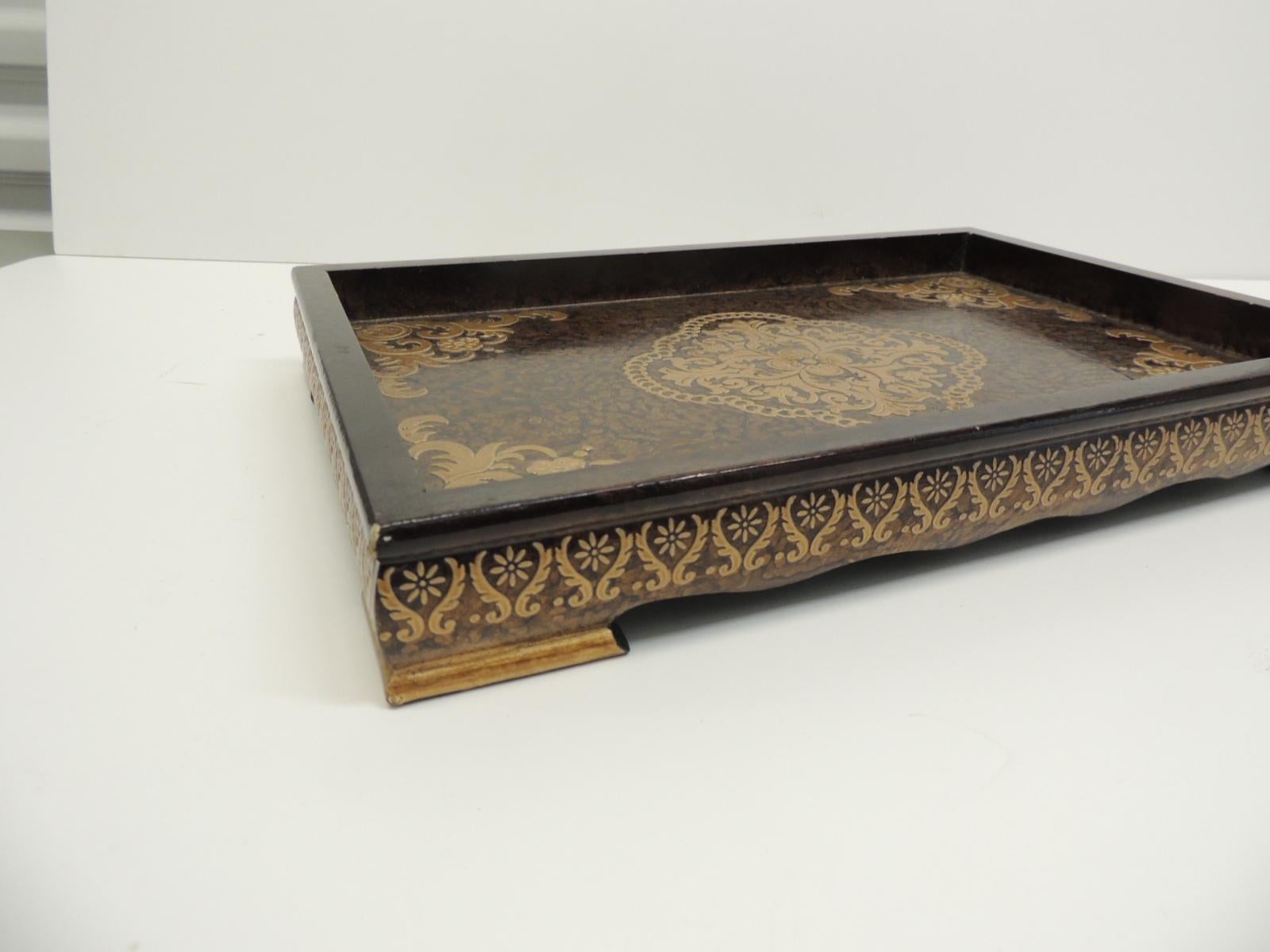 Asian lacquered decorative modern tray in brown and gold
Asian lacquered decorative tray with edged wood and floral details all around in brown and gold. Textured finish on the top.
Size: 15.5 x 10.5 x 2.