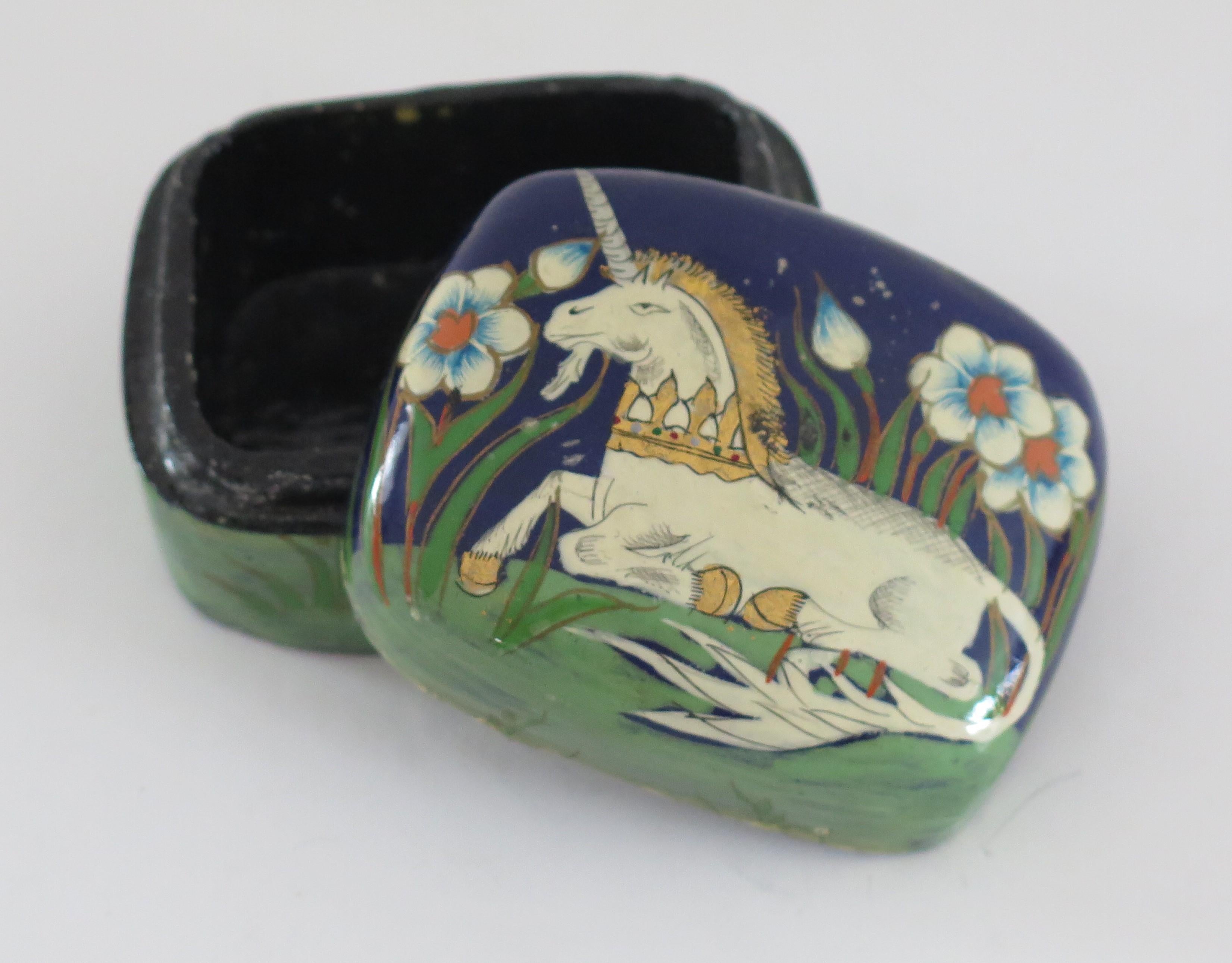 This is a good papier mâché, rectangular shaped black lacquered lidded box, hand enamelled and gilded, made in Asia, possibly Japan during the mid 20th Century.

This rectangular shaped papier mâché box has a well fitting lid, with the box lid
