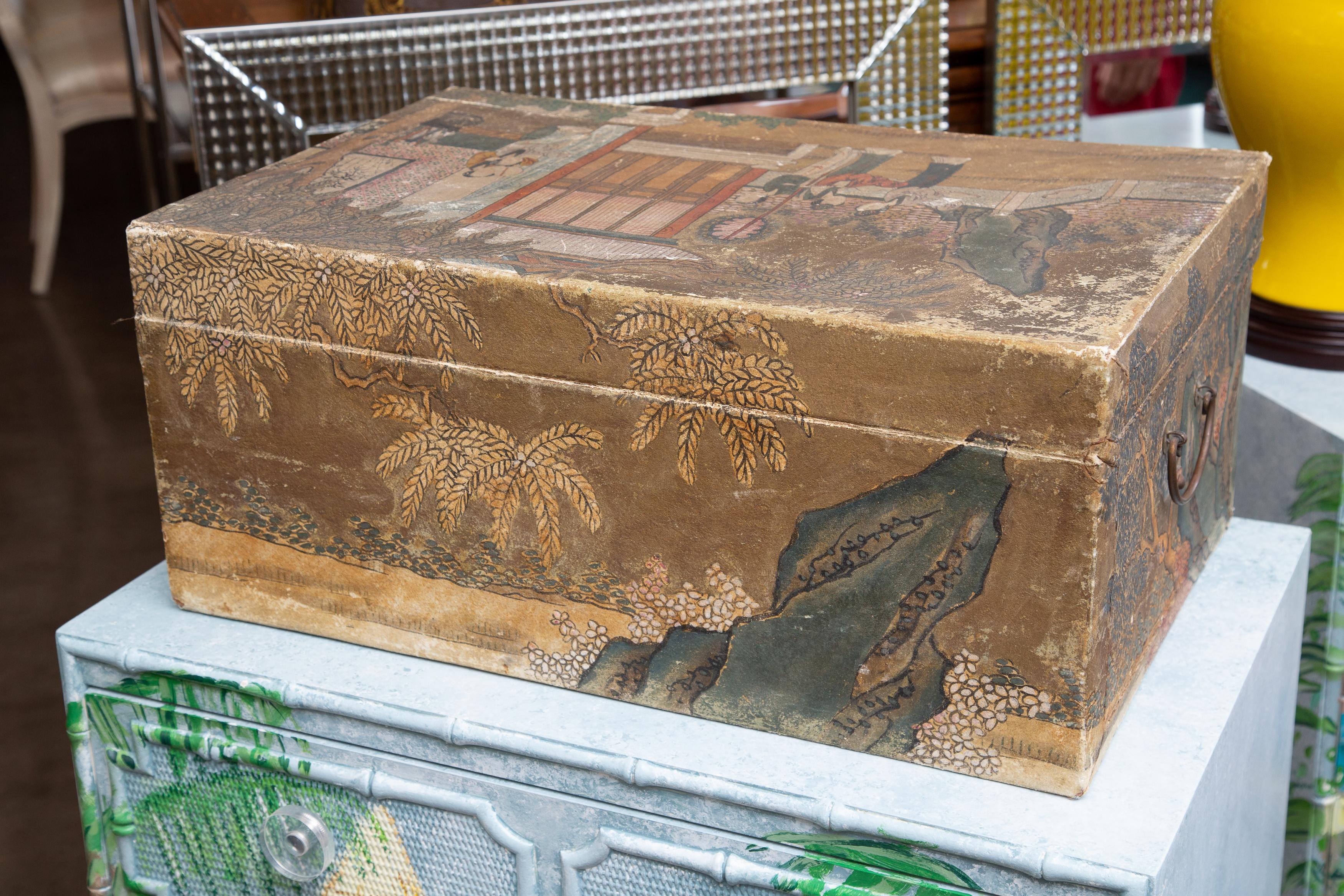 Animal skin covered trunk. The perfectly covered box is hand painted with muted and soft colors. 19th century.